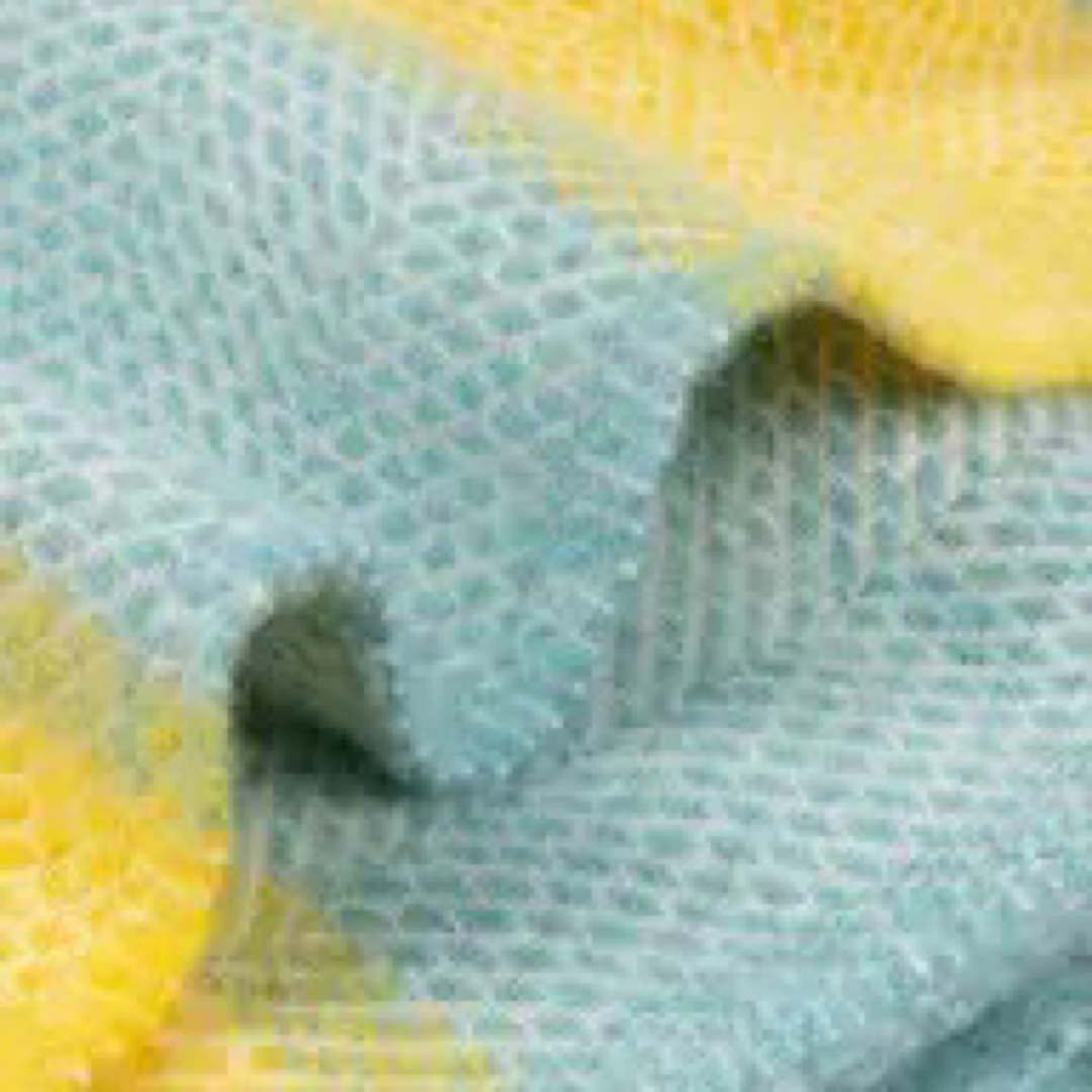 This yellow and pale blue striped super cosy and fluffy blanket is made from 100% pure new wool and finished with extra brushing to make it super soft.