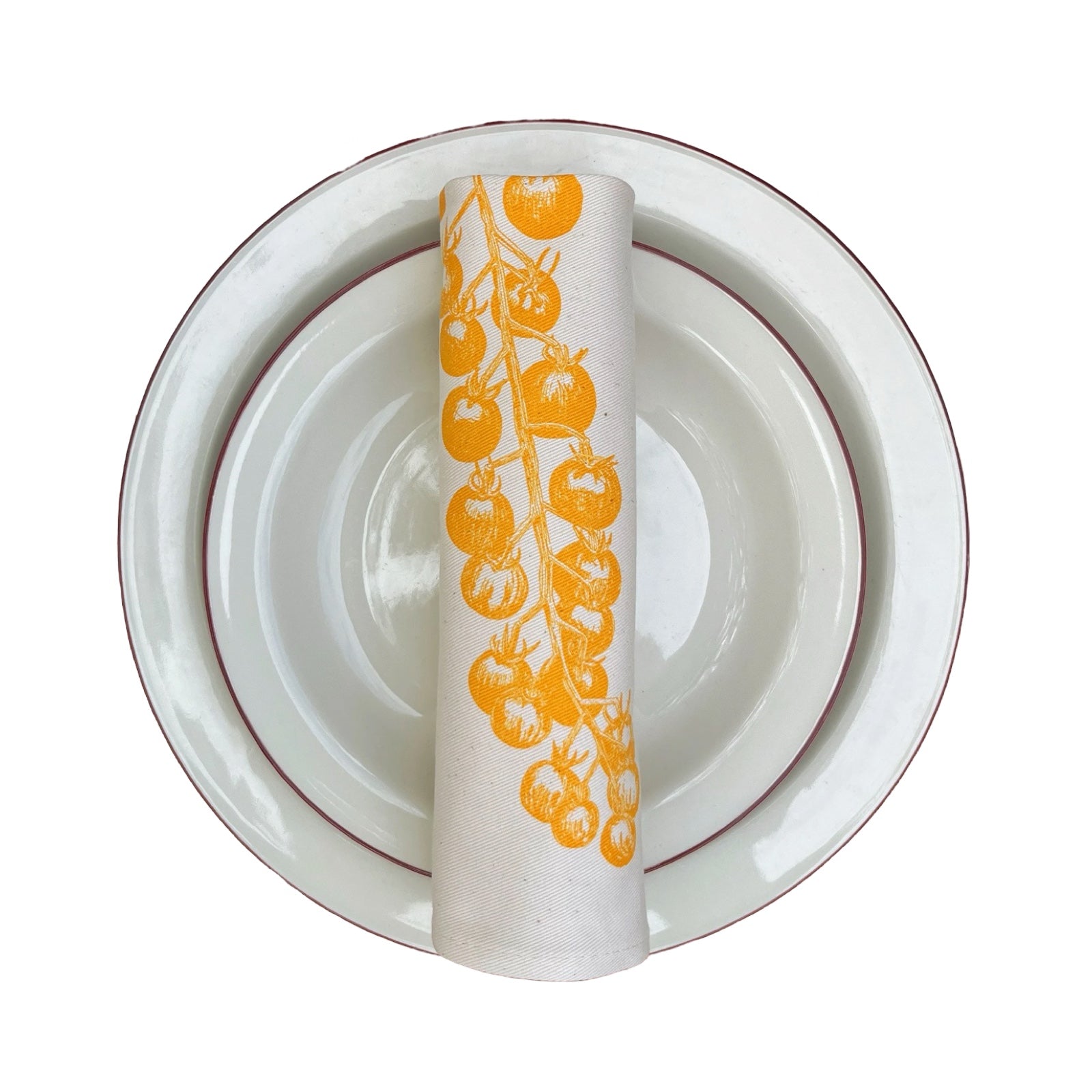 Handmade screen-printed cotton serviettes featuring original illustrations of tomato vines.