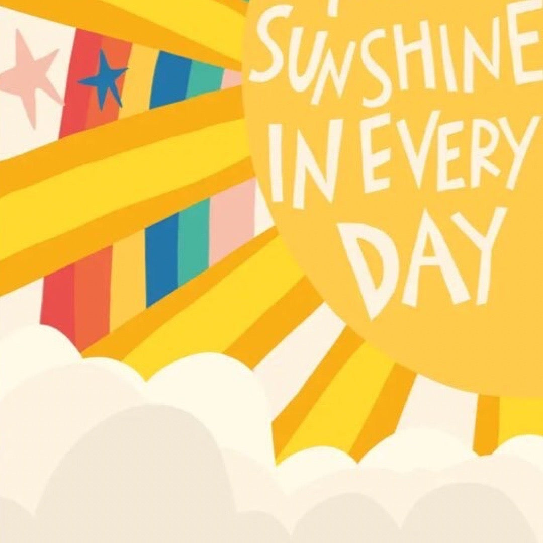 Print with 'sunshine in every day' text with colourful rainbow, sun and clouds.