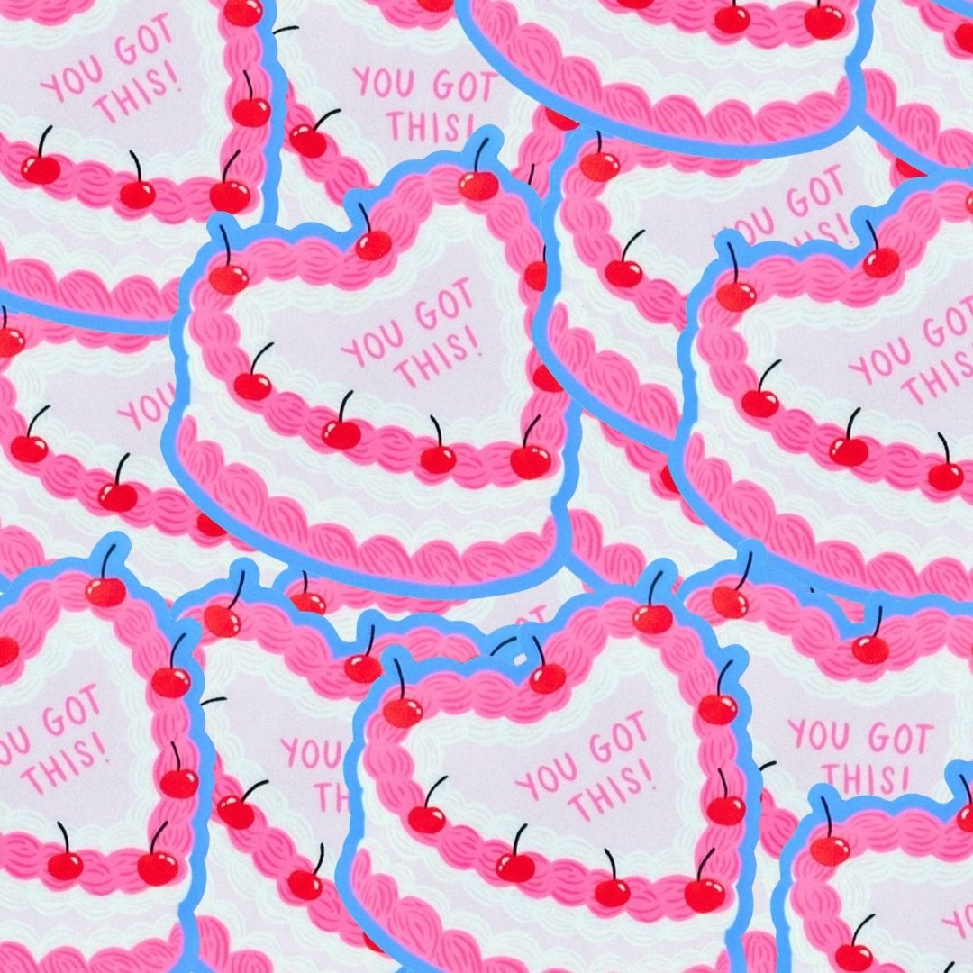 Heart-shaped stickers with 'You Got This!' text and cherries on a light pink background.