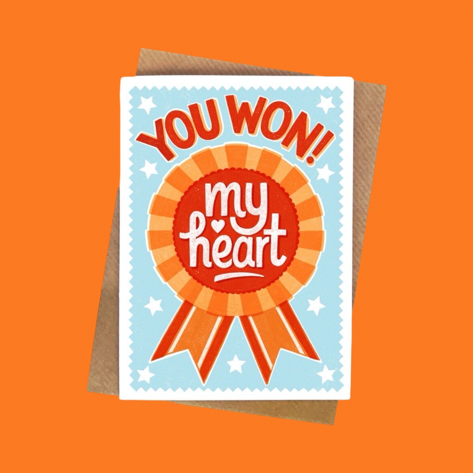 Greeting card with 'You won my heart' text on an orange background.