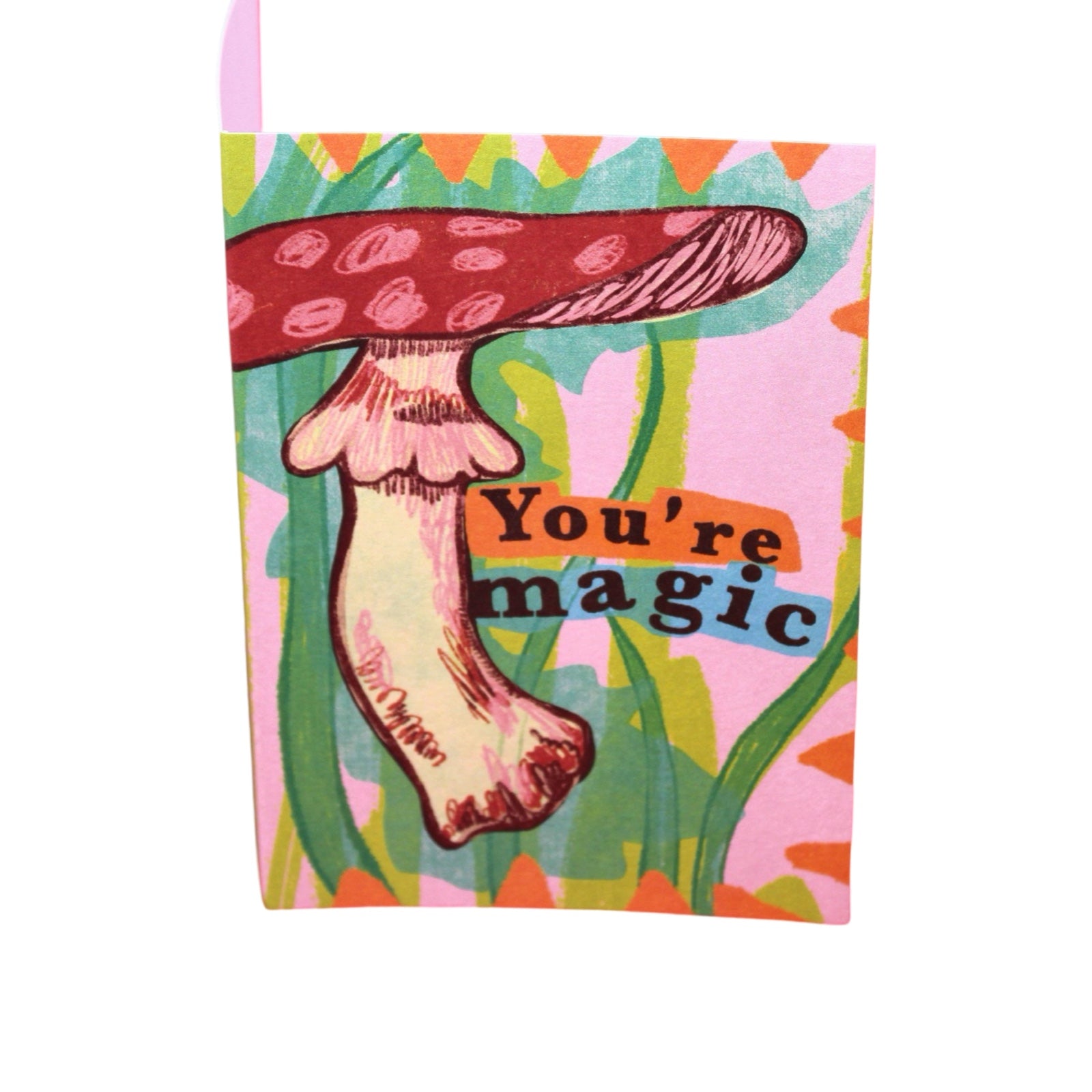 Card featuring a giant red mushroom and some green foliage with the text "You're Magic