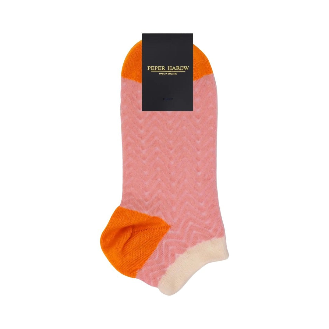 Ladies trainer socks in a pink and cream zig zag pattern with an orange heel.