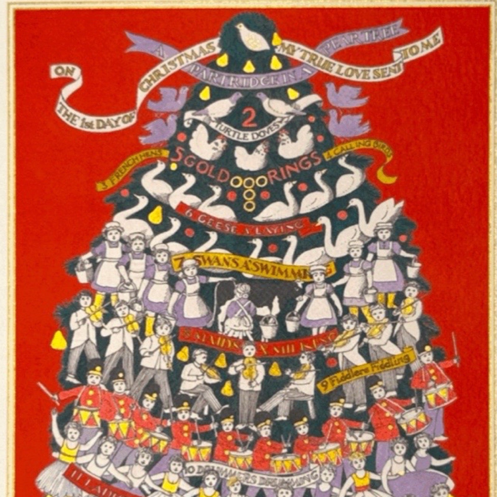 A festive illustrated Christmas tree matchbox with a red background, featuring numerous stylised characters in holiday and costume attire, including swans, birds, and figures in red, white, black, and purple.