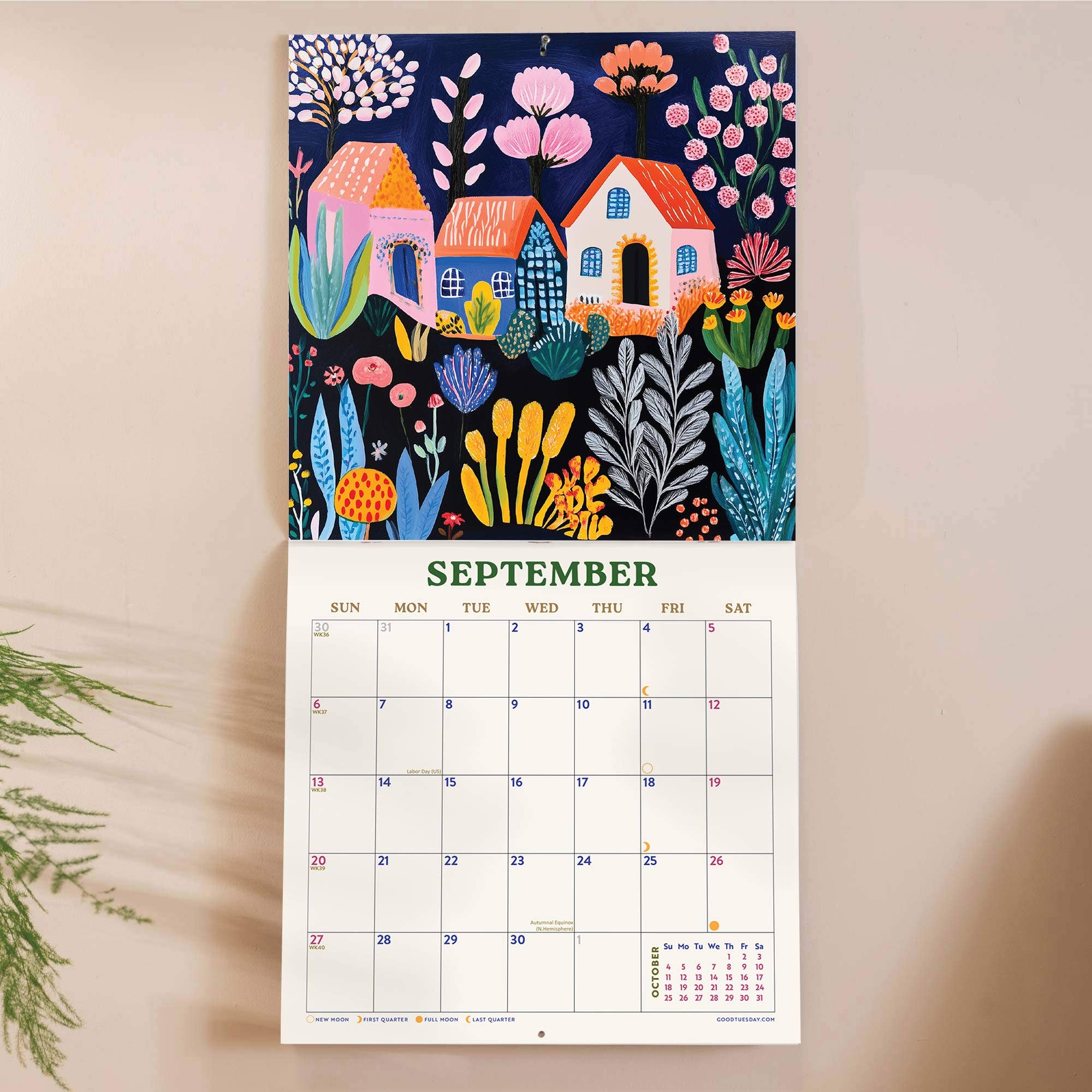 A botanical-themed wall calendar featuring 12 bright and colourful folk themed illustrations. 