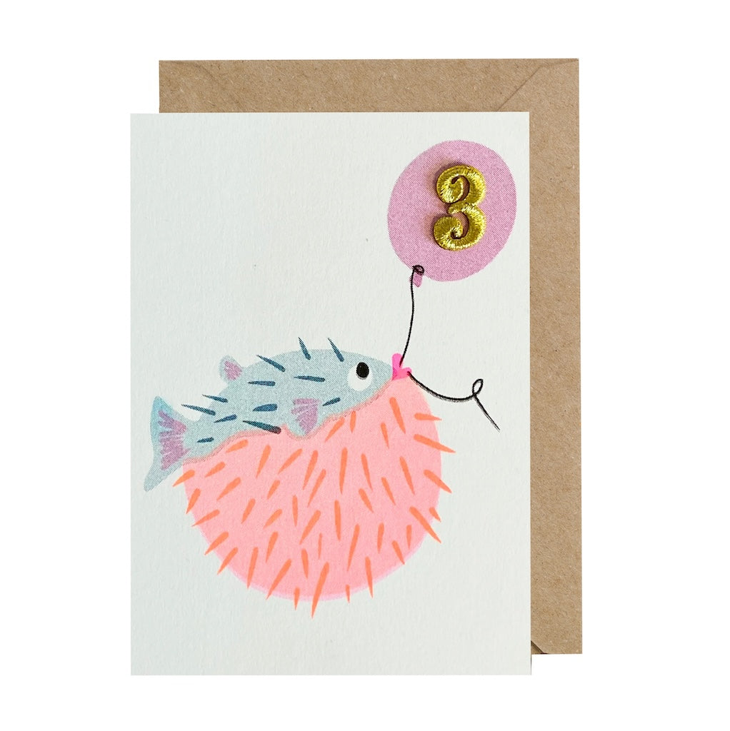 3rd birthday card featuring a cute pufferfish and '3' in a pink balloon and brown envelope.