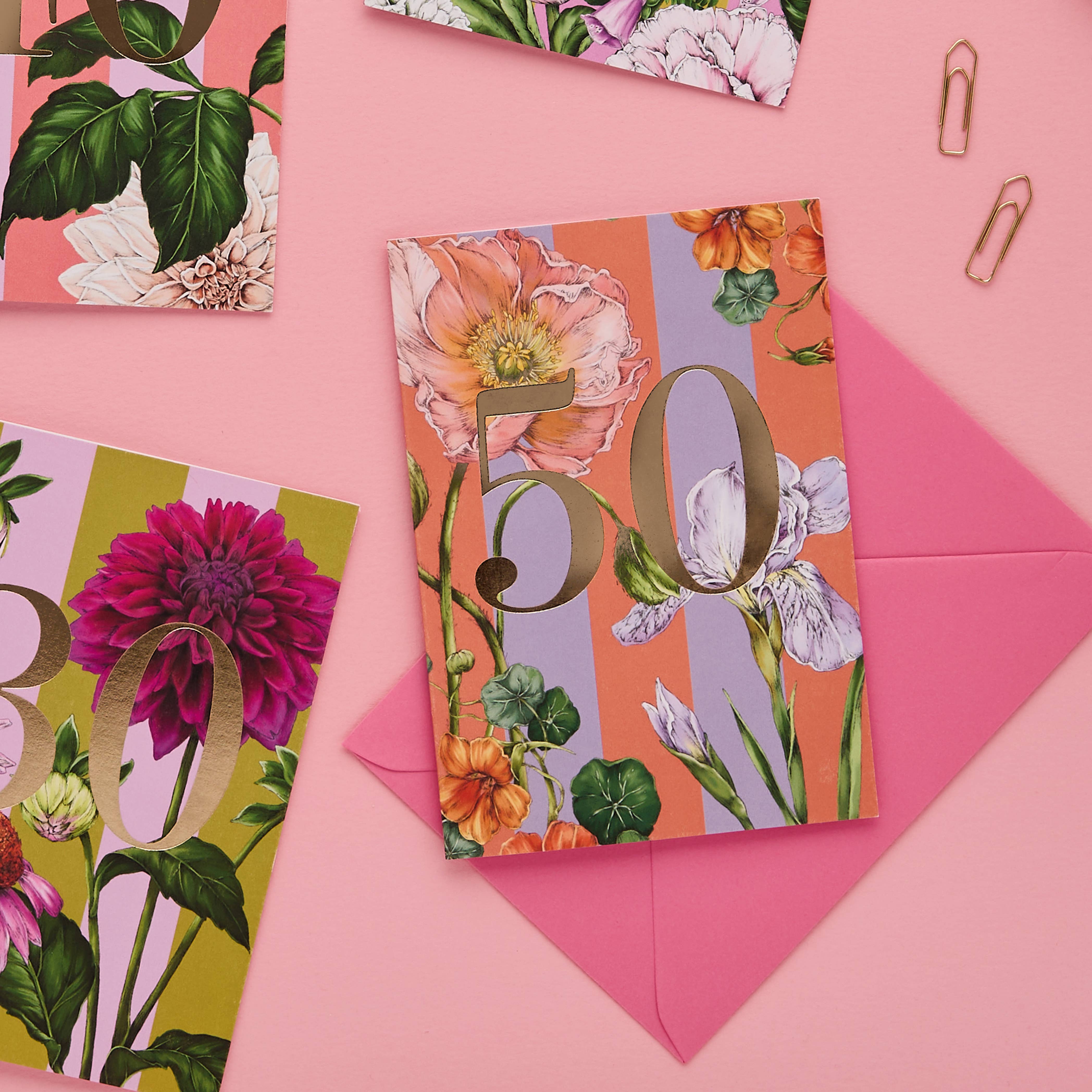 Floral birthday card with number 50 on a pink background.