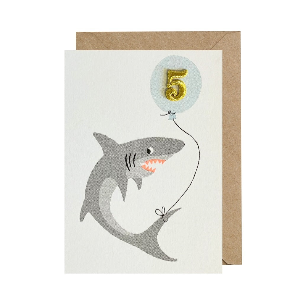 5th birthday card featuring a happy shark and '5' in a blue balloon.