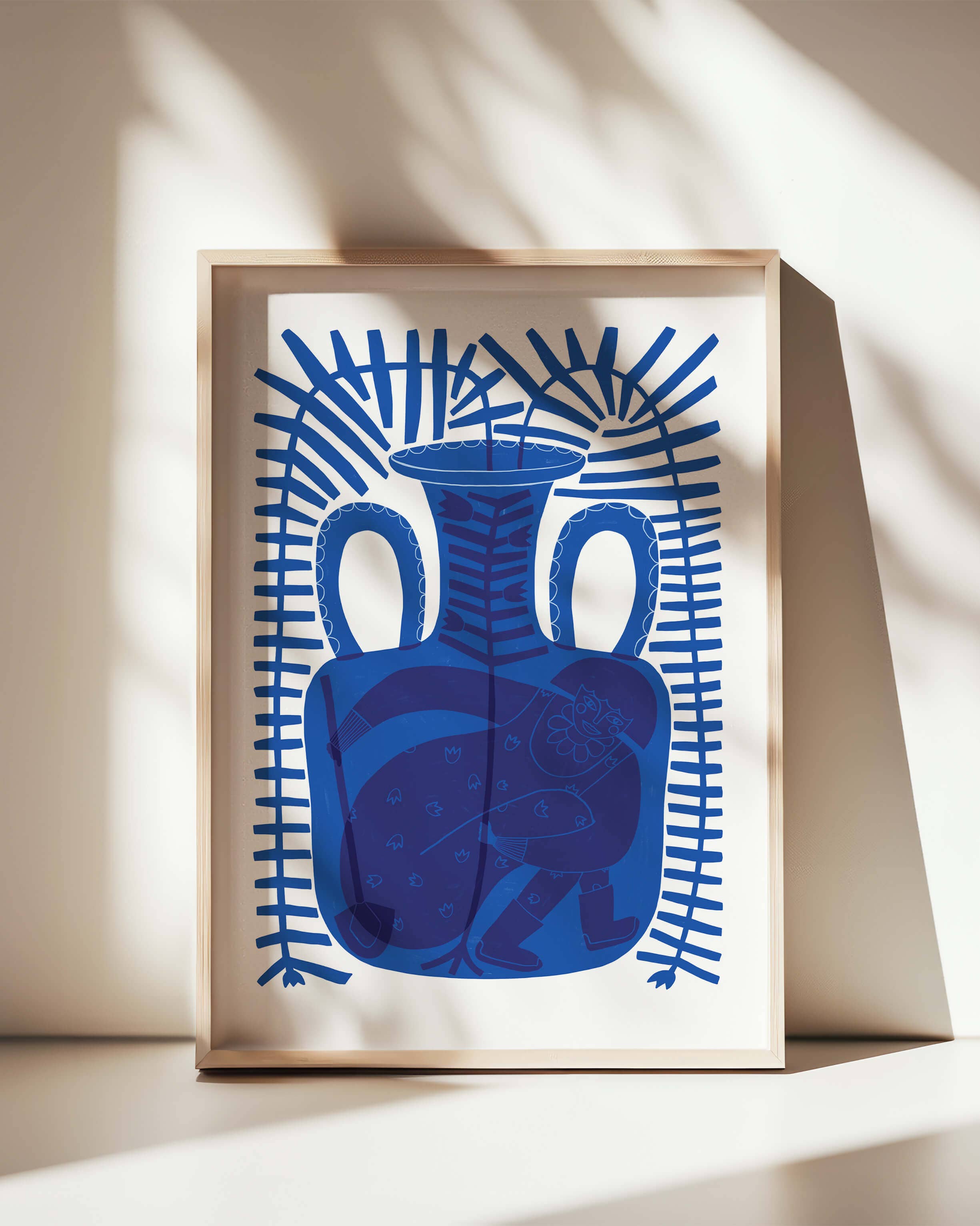 Framed artwork with a blue vase design on a neutral background.