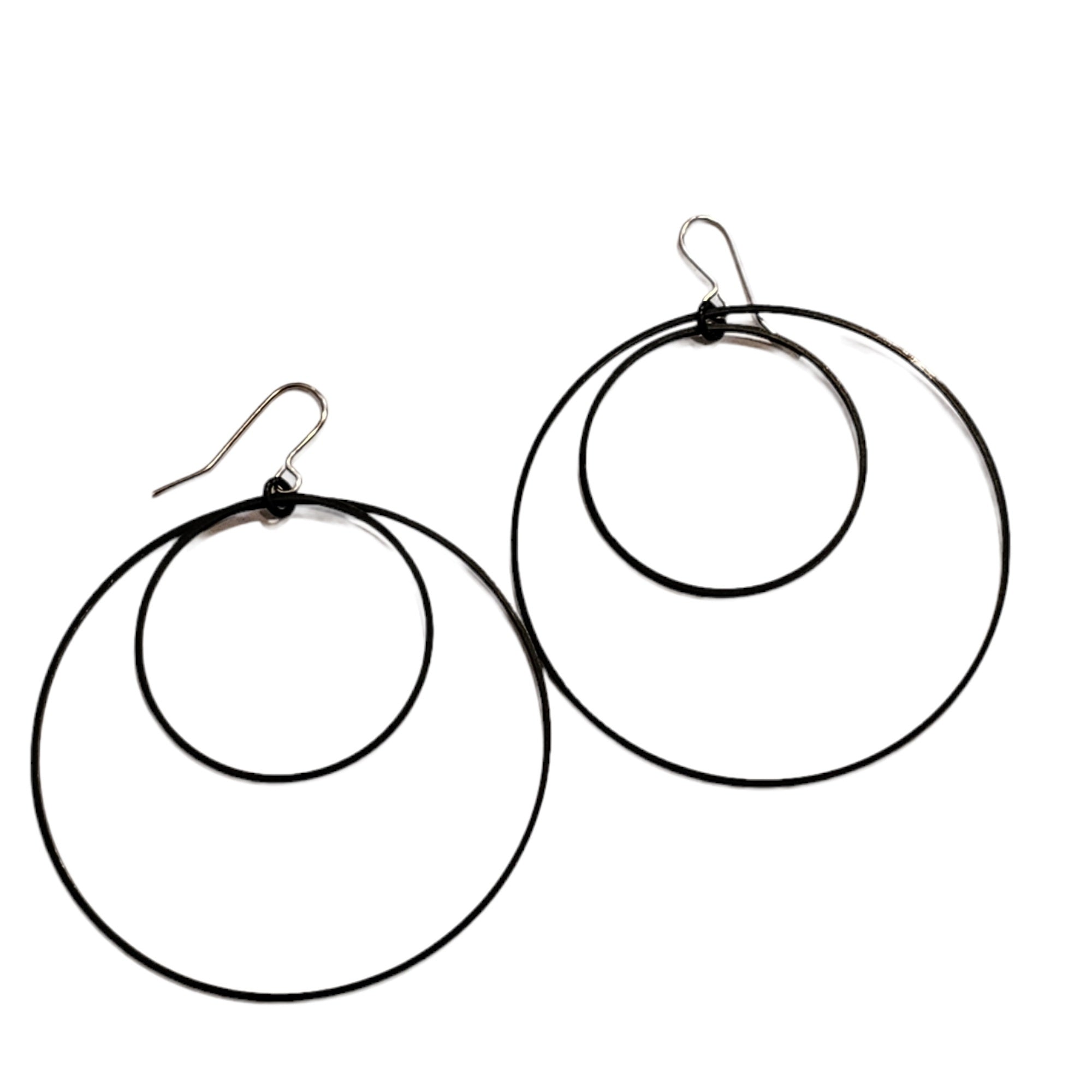 Image of circle hoop earrings against a white background.