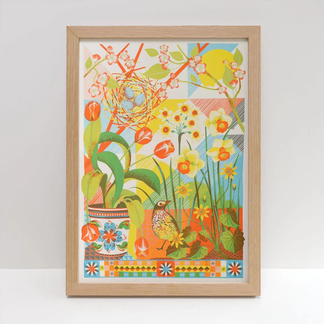 Framed colourful artwork with birds, flowers, and a nest on a white background