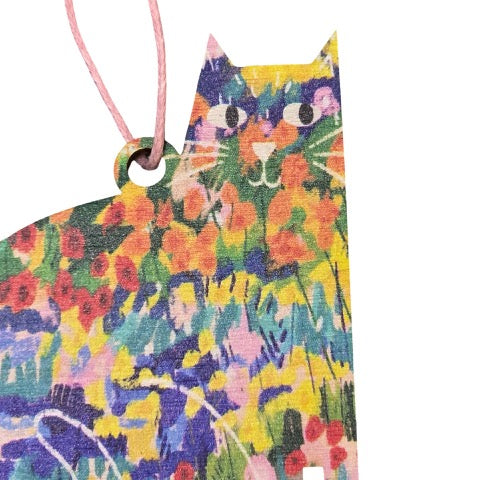 Cat-shaped wooden decoration featuring an illustration of colourful flowers in a garden, inspired by the Vincent Van Gogh painting 'The Garden at Arles'.