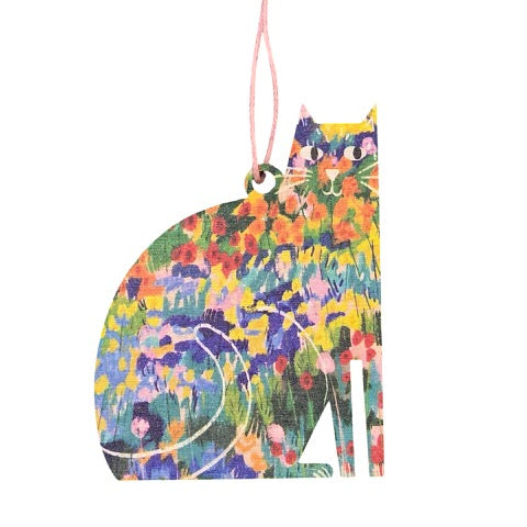 Cat-shaped wooden decoration featuring an illustration of colourful flowers in a garden, inspired by the Vincent Van Gogh painting 'The Garden at Arles'.