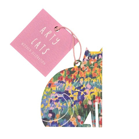 Cat-shaped wooden decoration featuring an illustration of colourful flowers in a garden, inspired by the Vincent Van Gogh painting 'The Garden at Arles'.