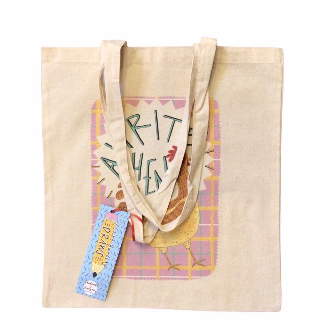 Tote bag featuring an illustration of a hen and the text 'Awrite Hen' on a pink tartan background.