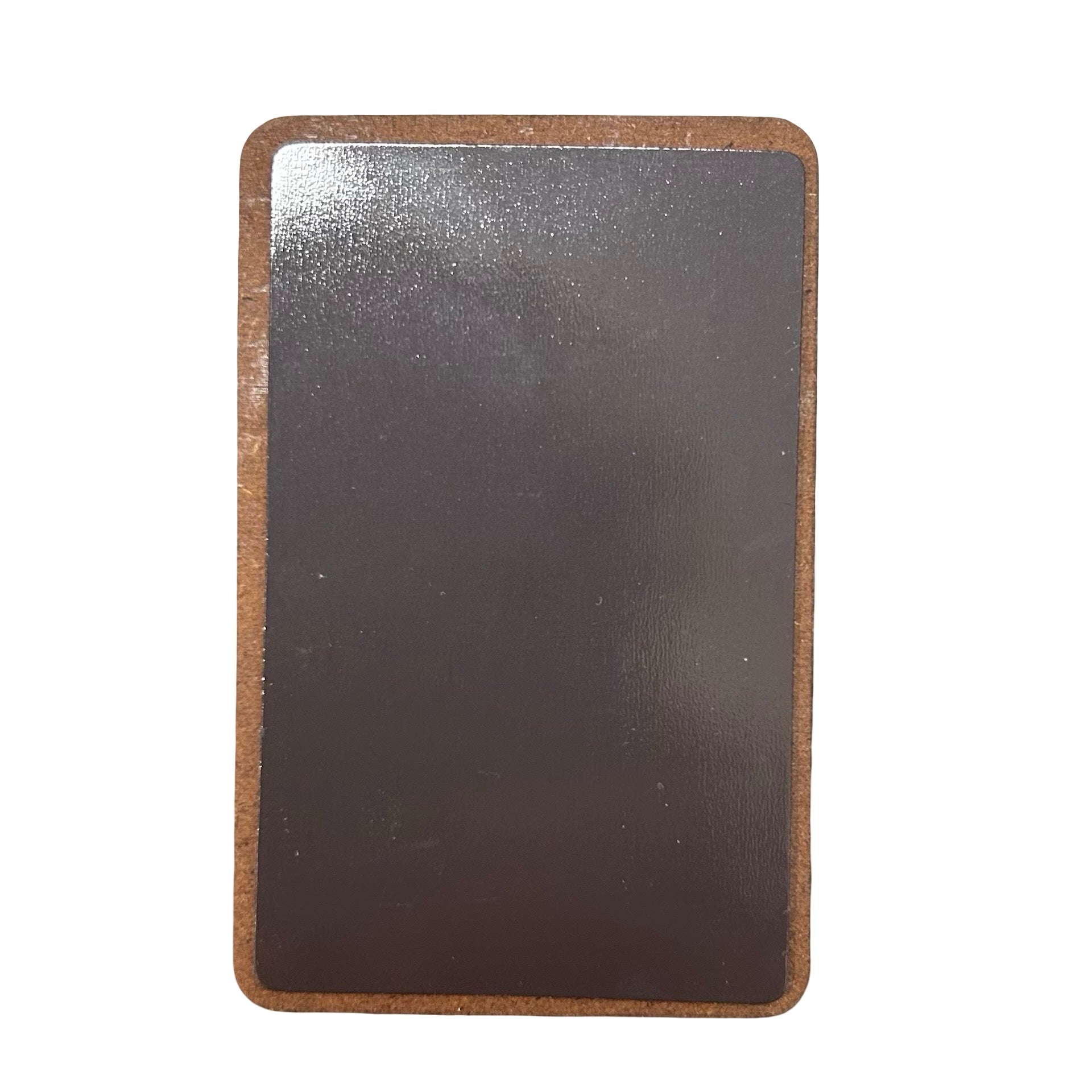 Rectangular back of magnet on a white background.