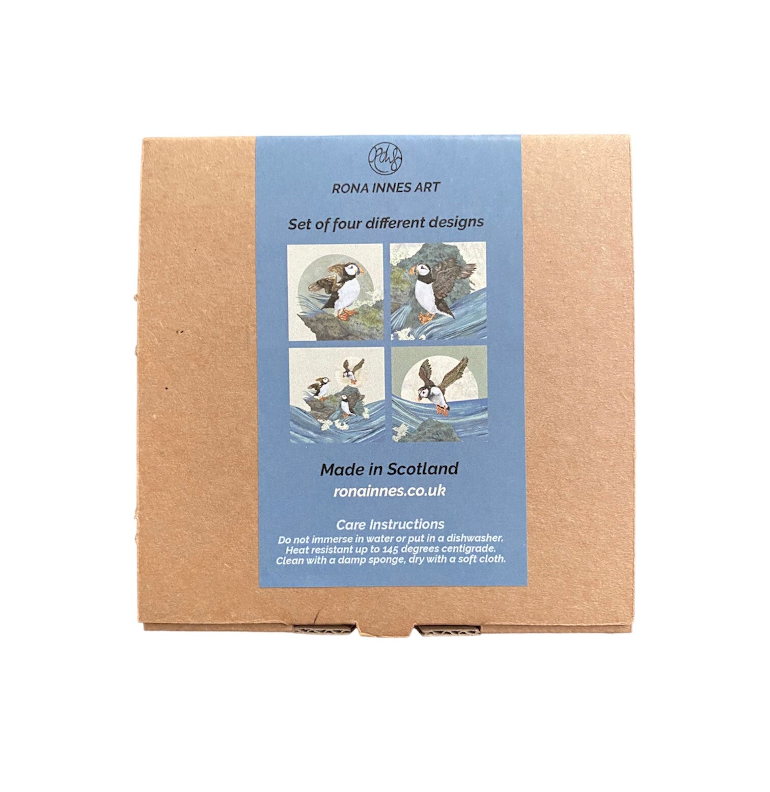 The back view of a boxed set of puffin coasters in a kraft brown box.