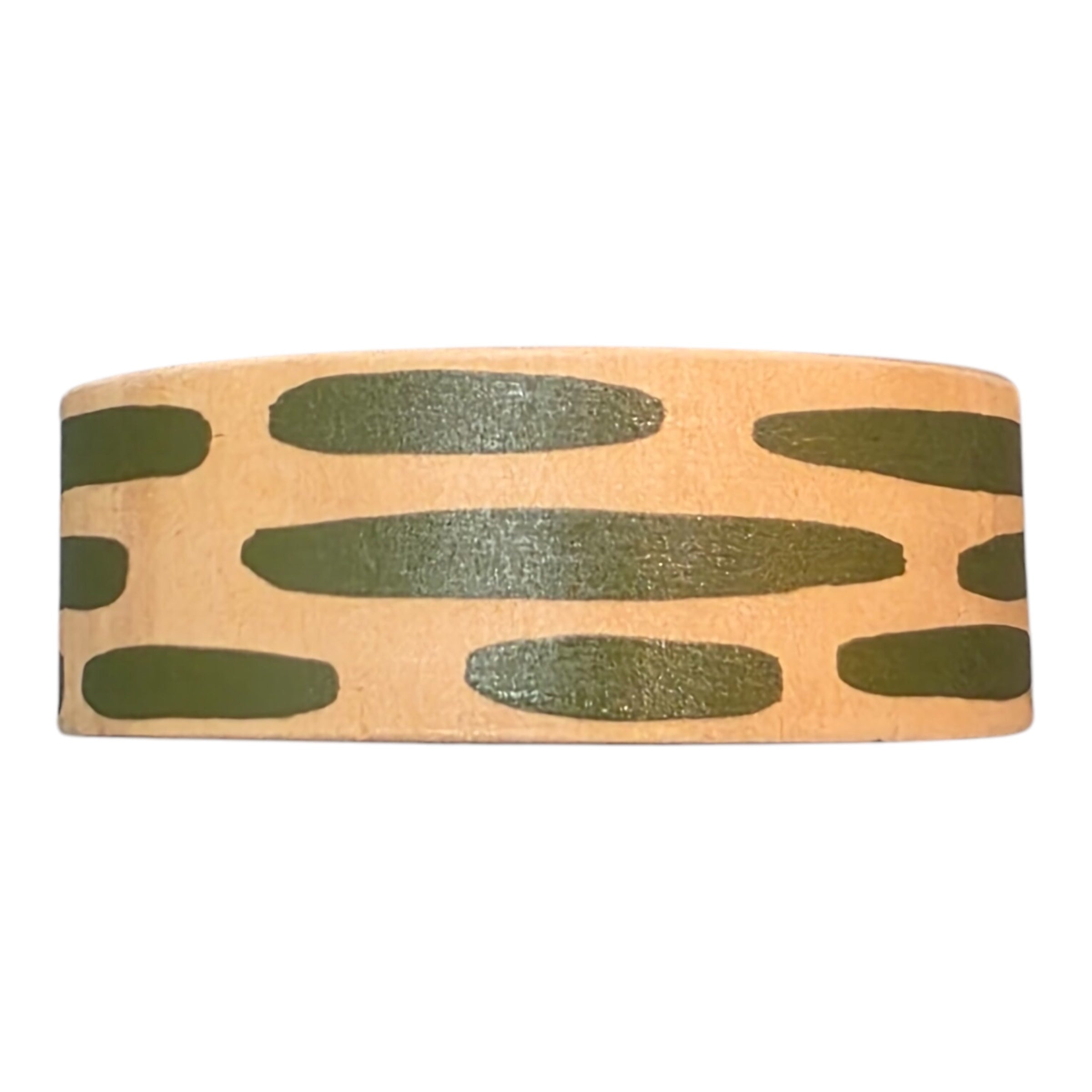 A bamboo wooden bangle with green dashes