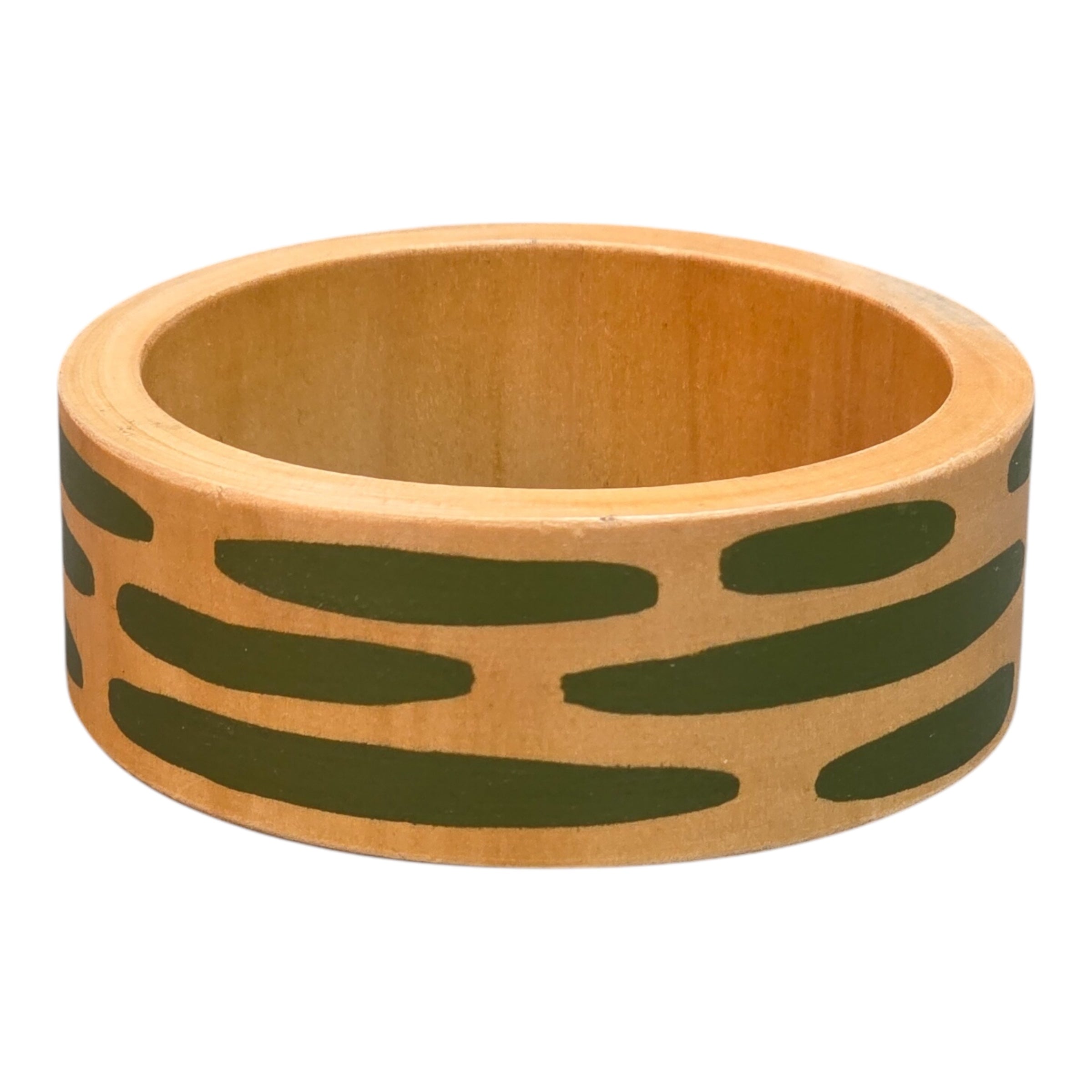 A bamboo wooden bangle with green dashes