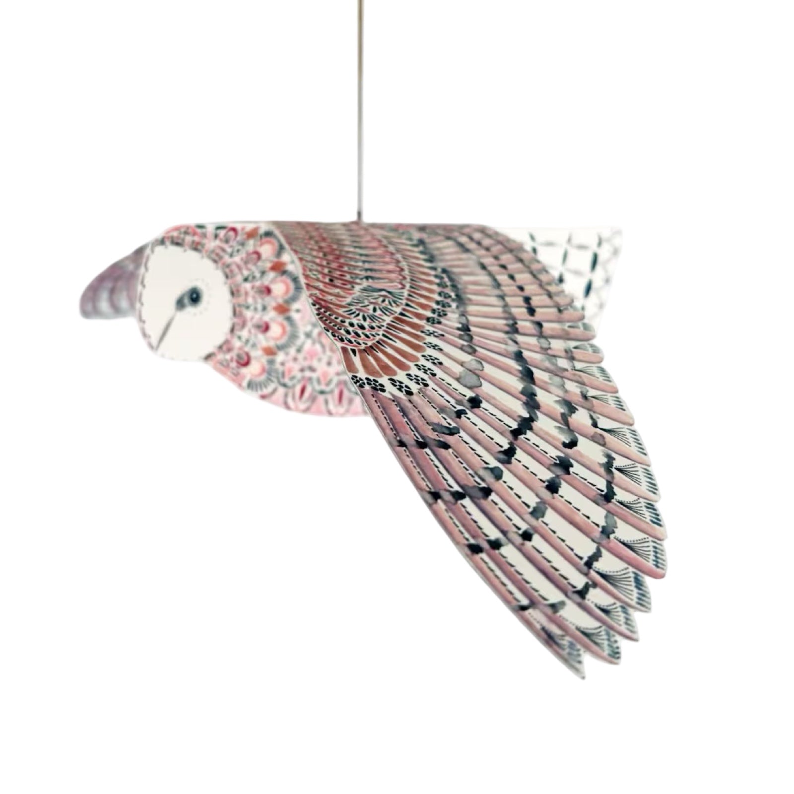 Decorative bird-shaped ornament with floral patterns on a white background.