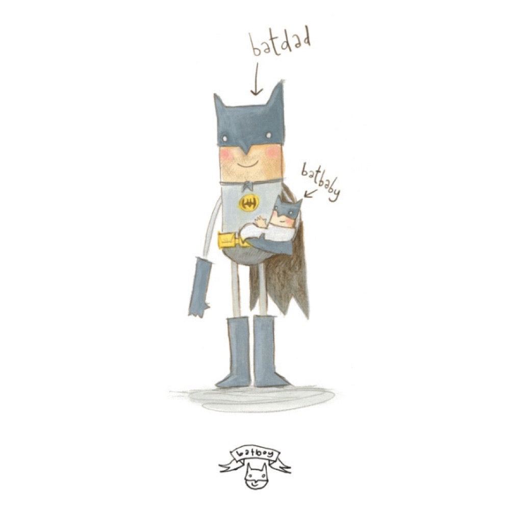 Batman holding a Batbaby, both labelled by arrows.