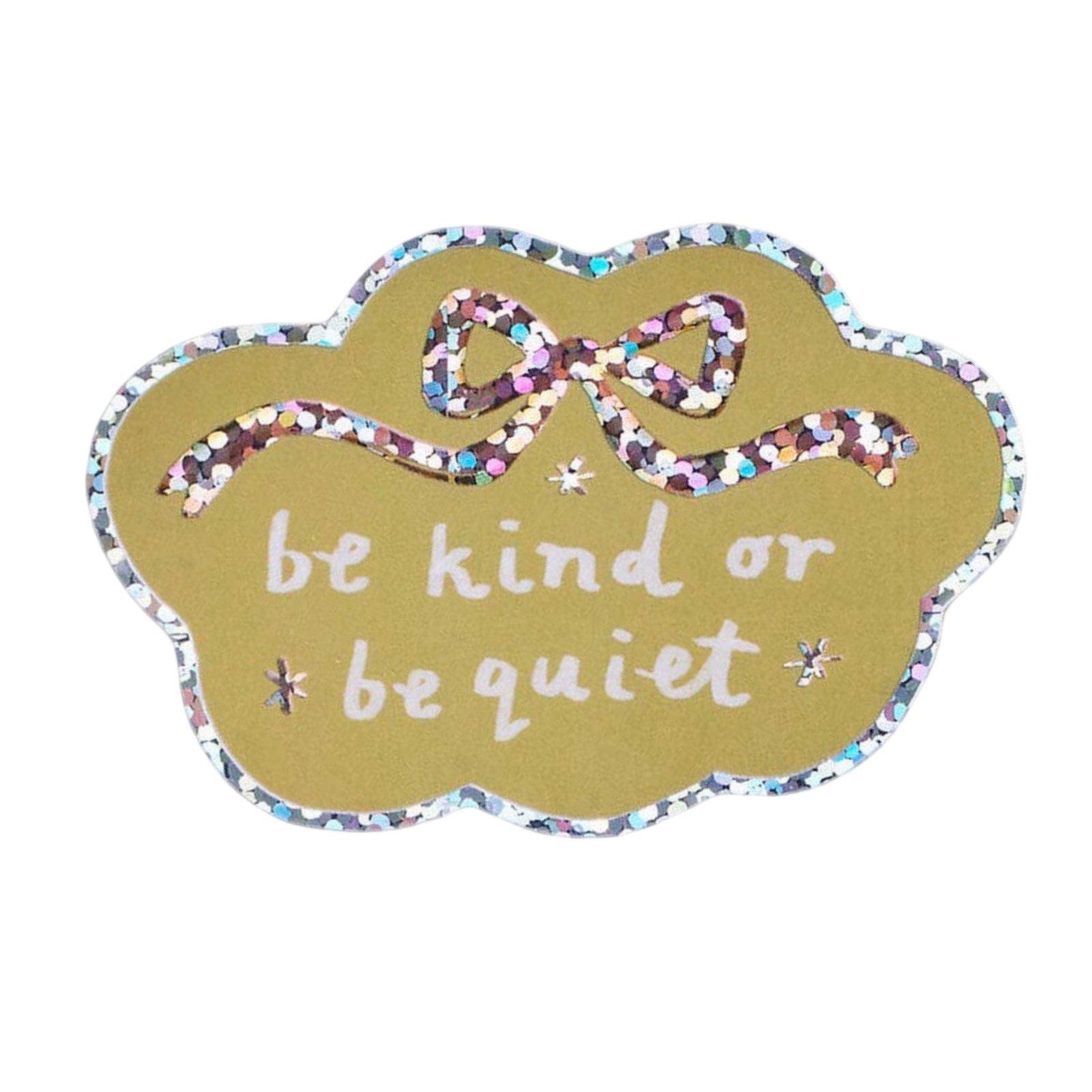 A cloud-shaped sticker with a glittery silver border, a glittery multicolour bow at the top, and the phrase 'be kind or be quiet' in white script on a muted gold background.