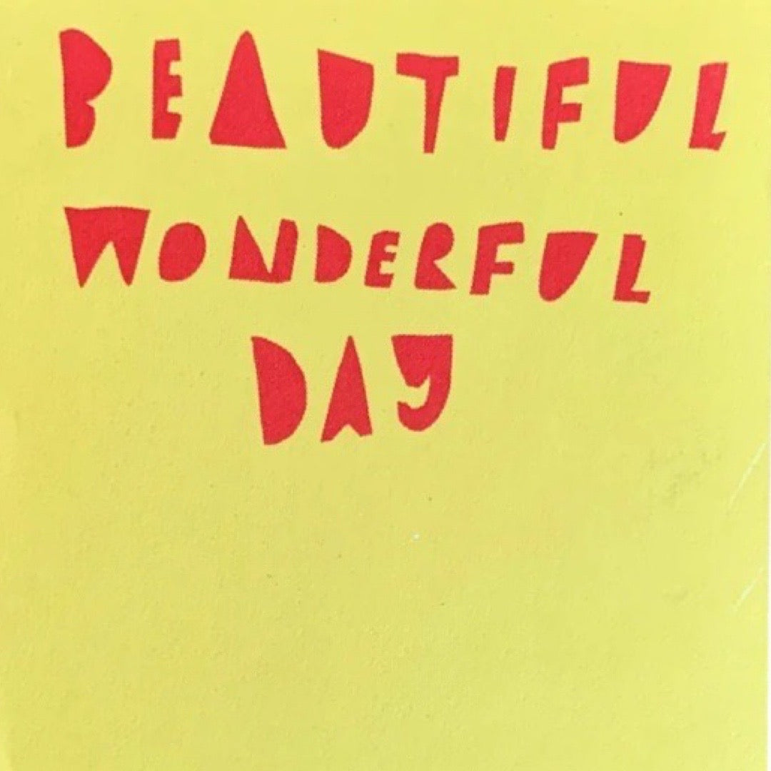 Yellow background with red text 'BEAUTIFUL WONDERFUL DAY'