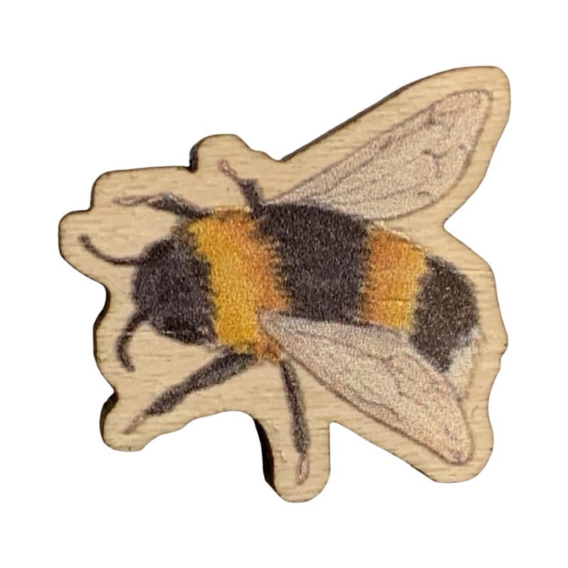 Mini wooden bee-shaped pin badge of a bee in flight.
