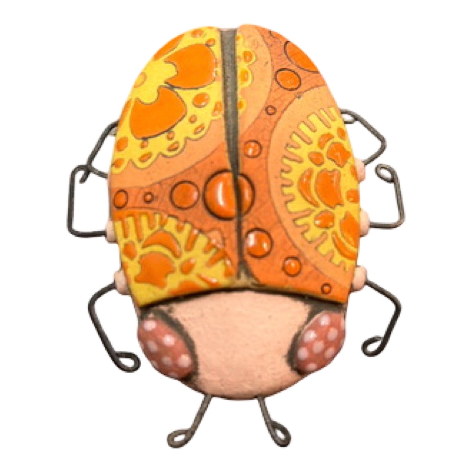 An oval ceramic beetle in orange with orange and yellow flowers and wire legs.
