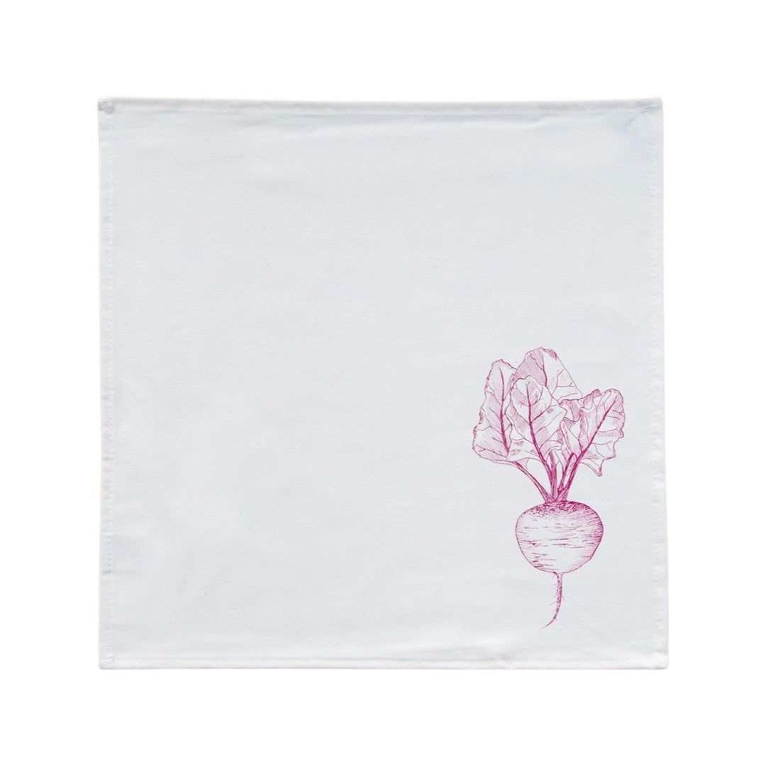 Cream cotton napkin with a pink beetroot.