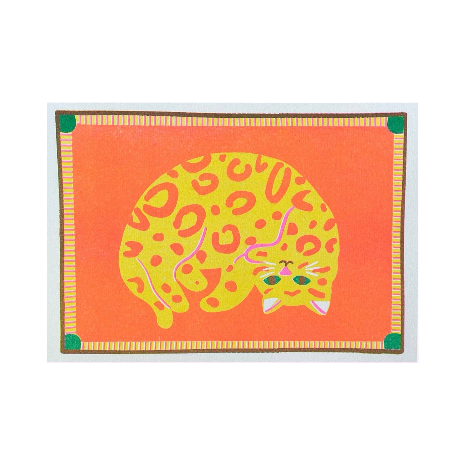 Placemat with a yellow animal design on an orange background.