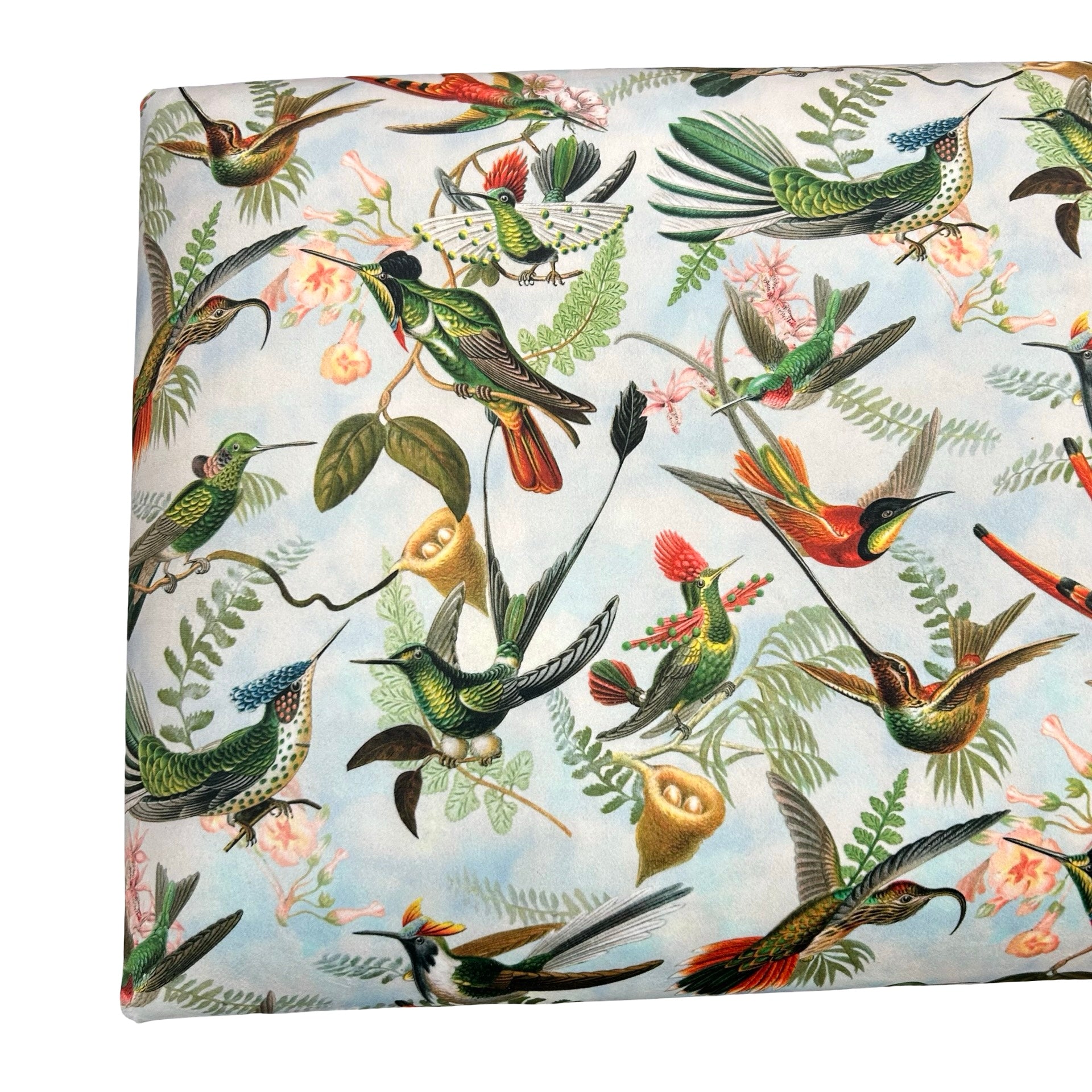 Velvet birds pattern on a bench.