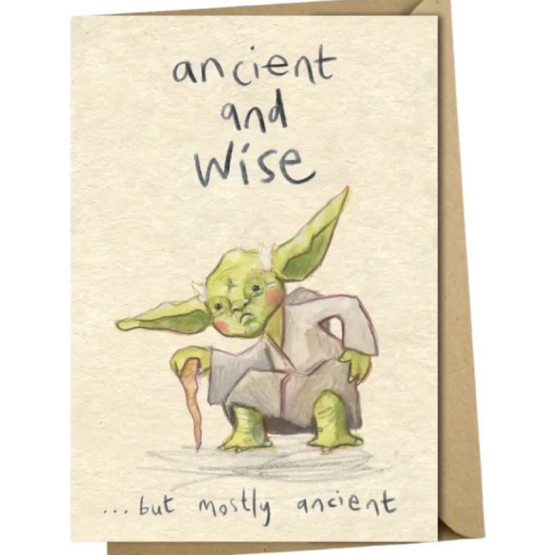 Illustration of yoda with text 'ancient and wise' on a beige background.
