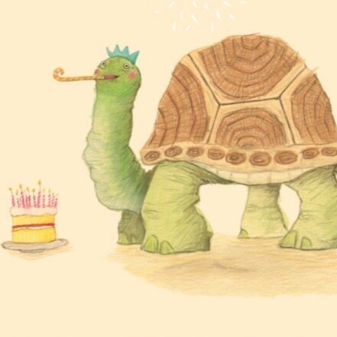 Birthday card with an illustration of a turtle with a kazoo in its mouth. A birthday cake with lots of candles sits next to the turtle.