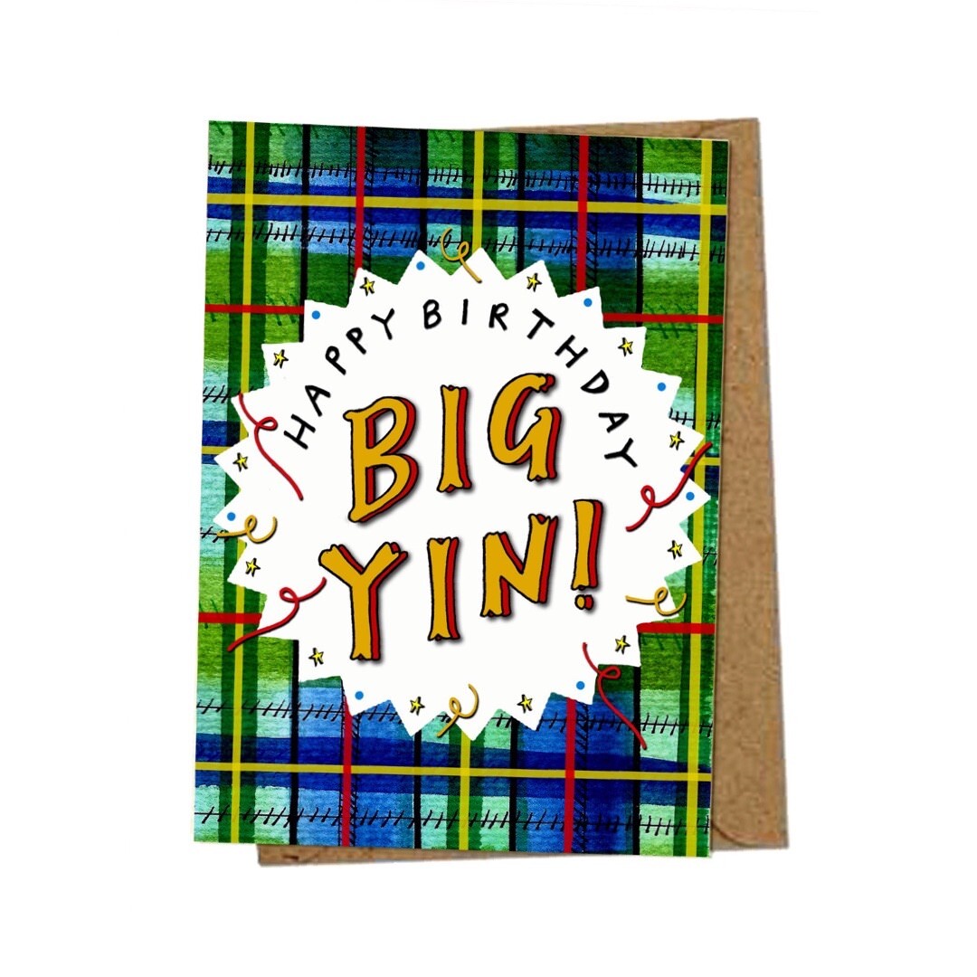 Birthday card with the text 'Happy Birthday Big Yin' inside a white pointy-edged circle on a blue and green tartan background.