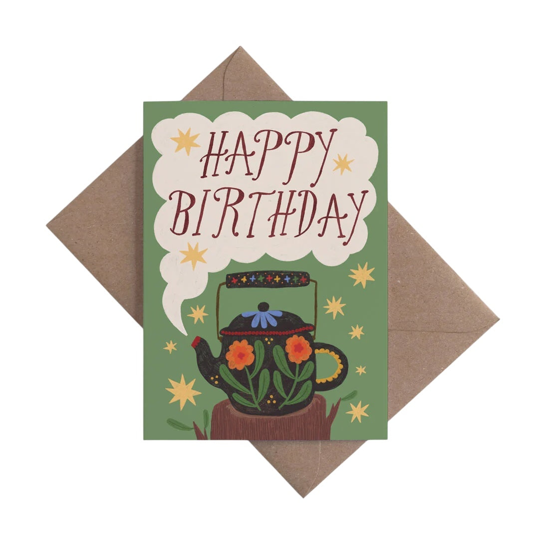 An image of a card with a floral teapot and the words happy birthday. 