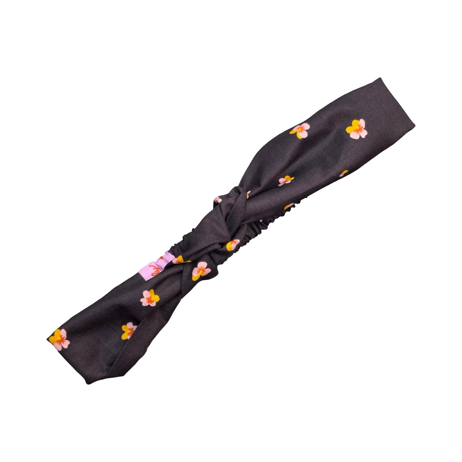 This handmade black floral knotted headband is made from 100% cotton fabric with pink and yellow violets.