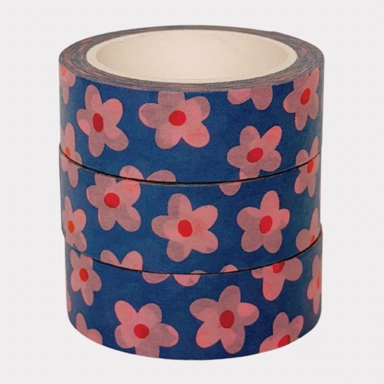 Rolls of decorative tape with pink flowers on a blue background.