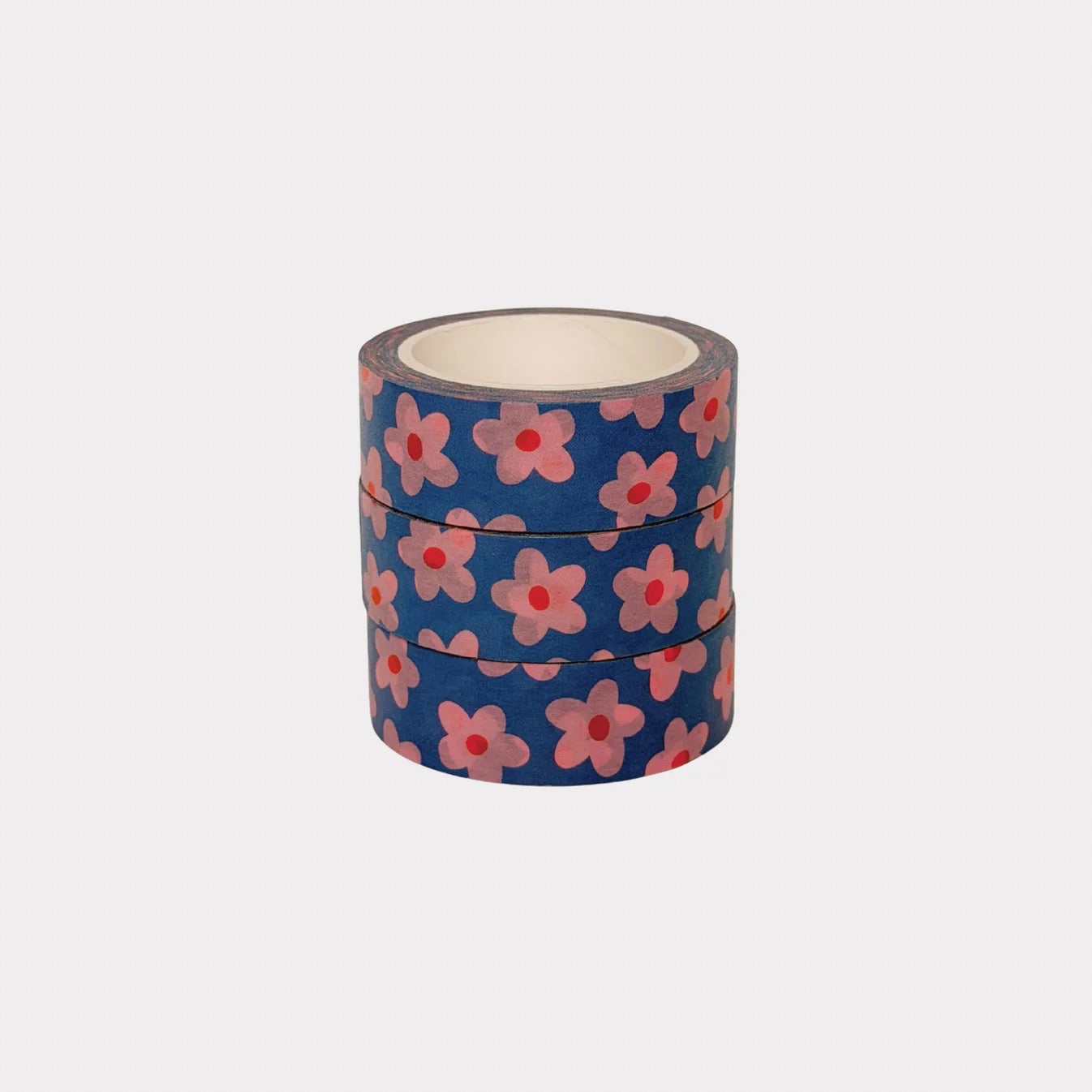 Three rolls of floral-patterned tape on a light grey background.