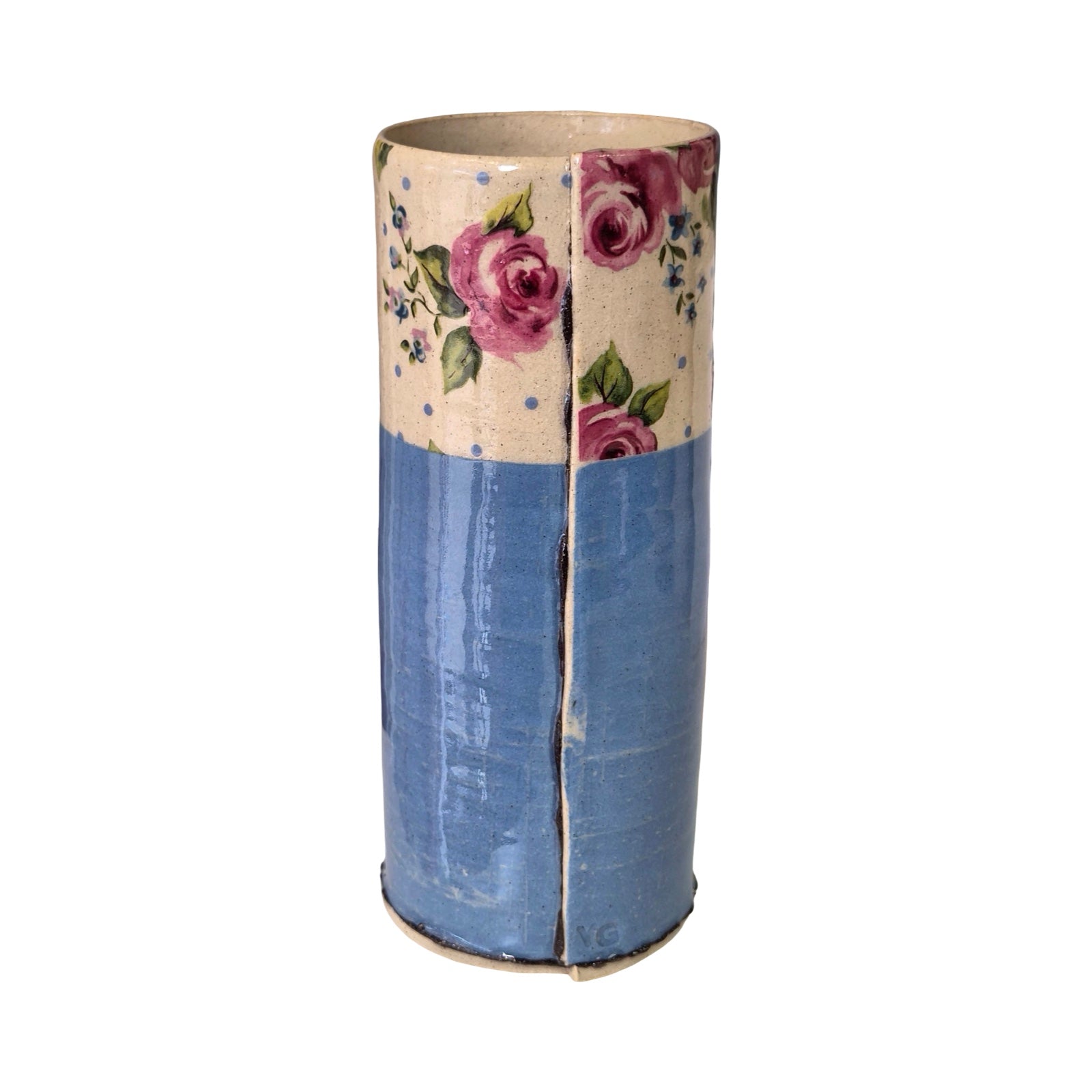 Cylindrical vase with floral design on a white background.