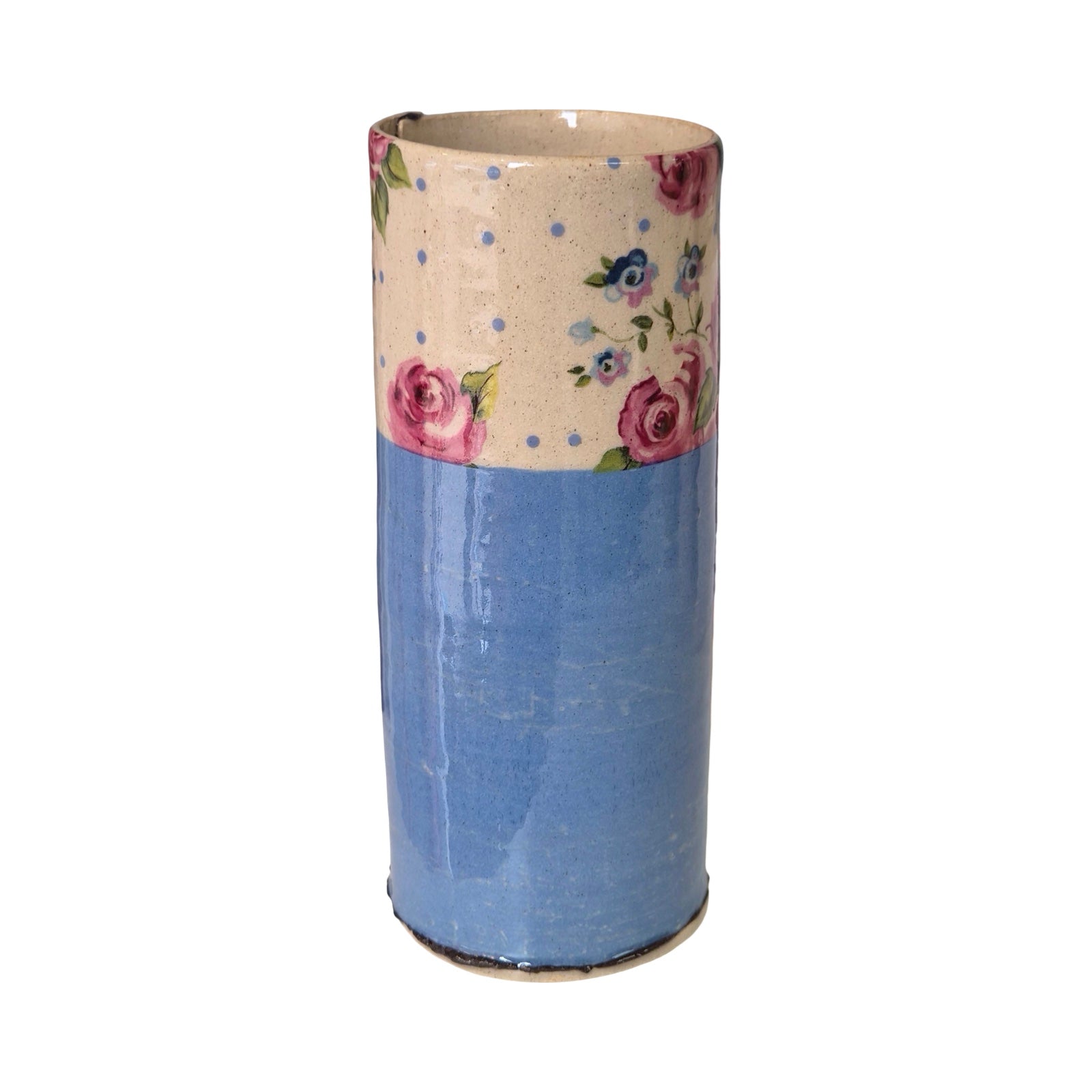 Cylindrical vase with floral patterned top and blue base on a white background.
