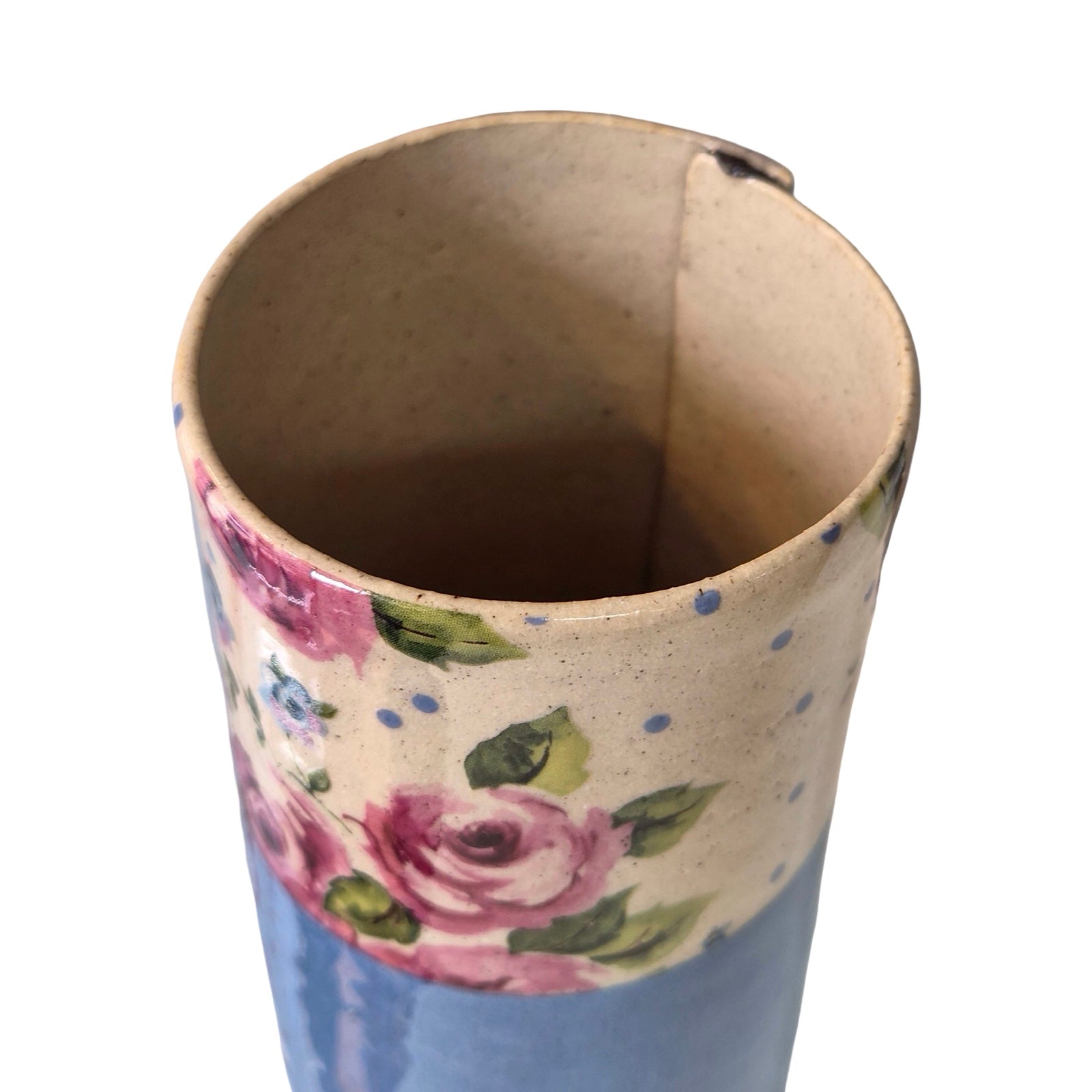 Floral blue vase inside.