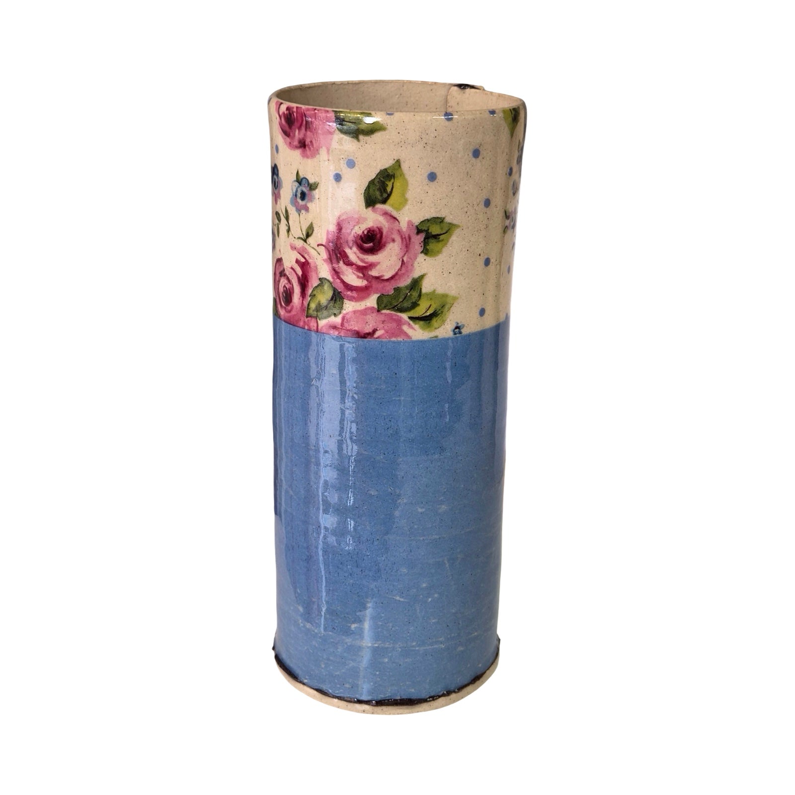 Cylindrical vase with floral top section and blue bottom section on a white background.