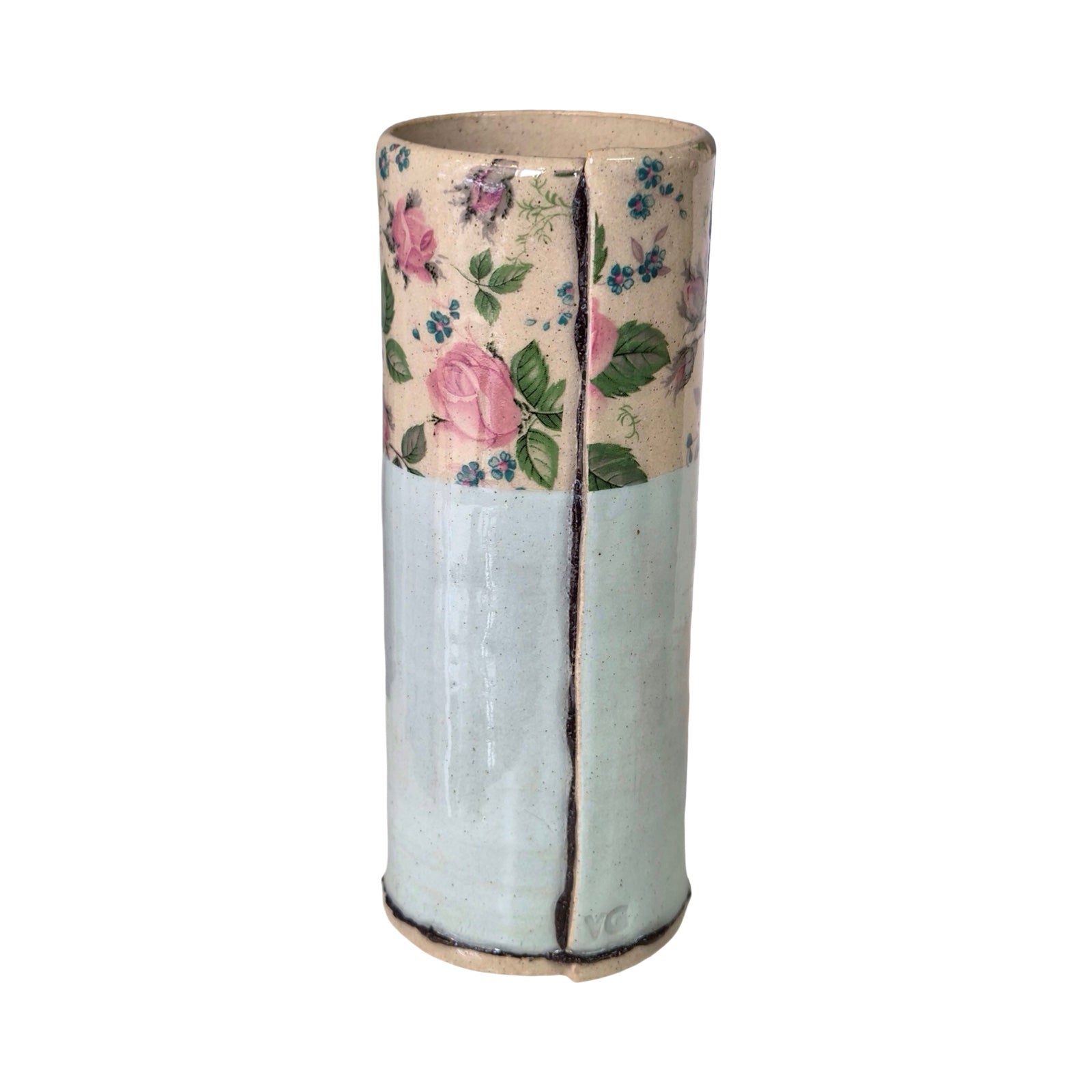 Cylindrical vase with floral pattern on top and plain white bottom on a white background.
