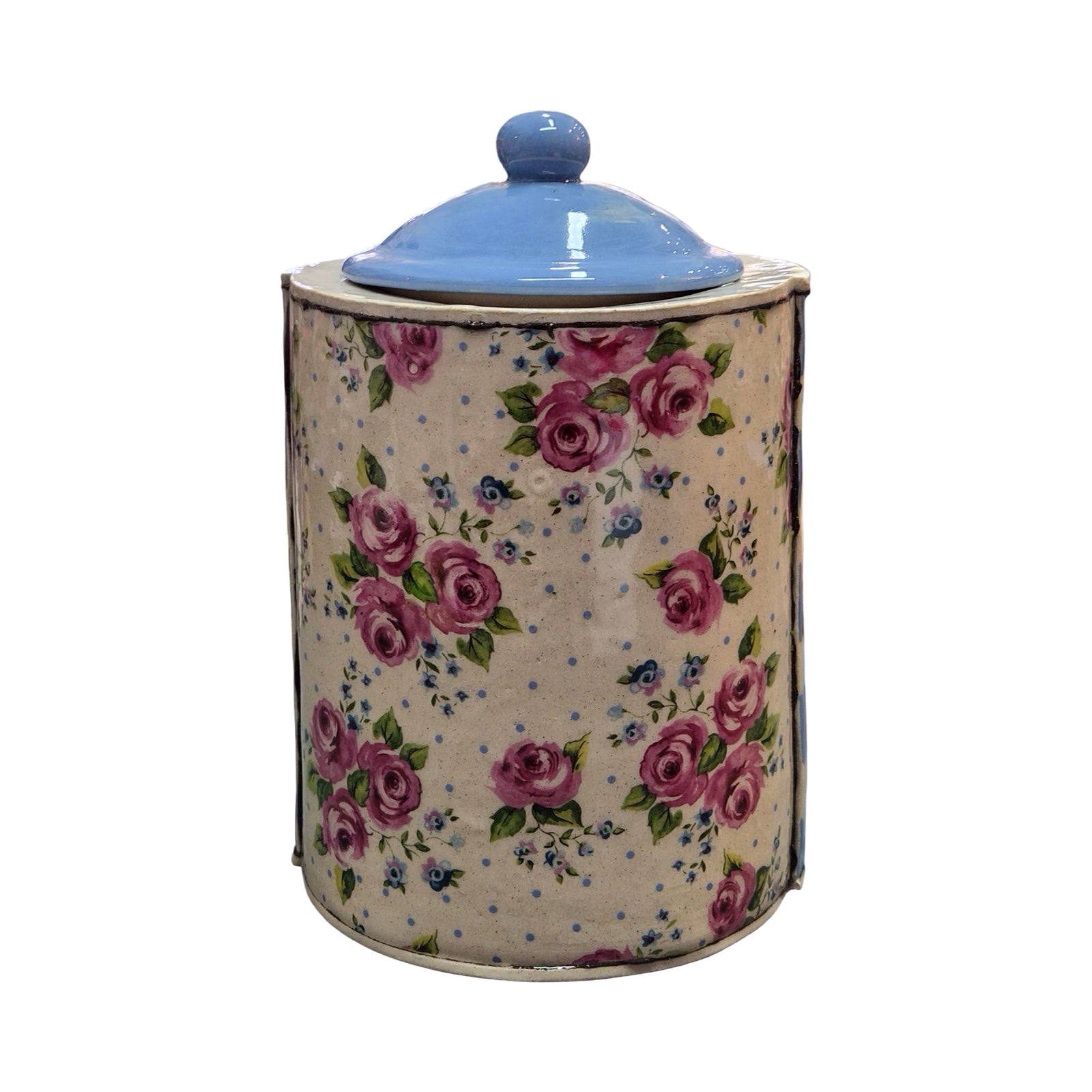 Decorative jar with floral pattern and blue lid on a white background.