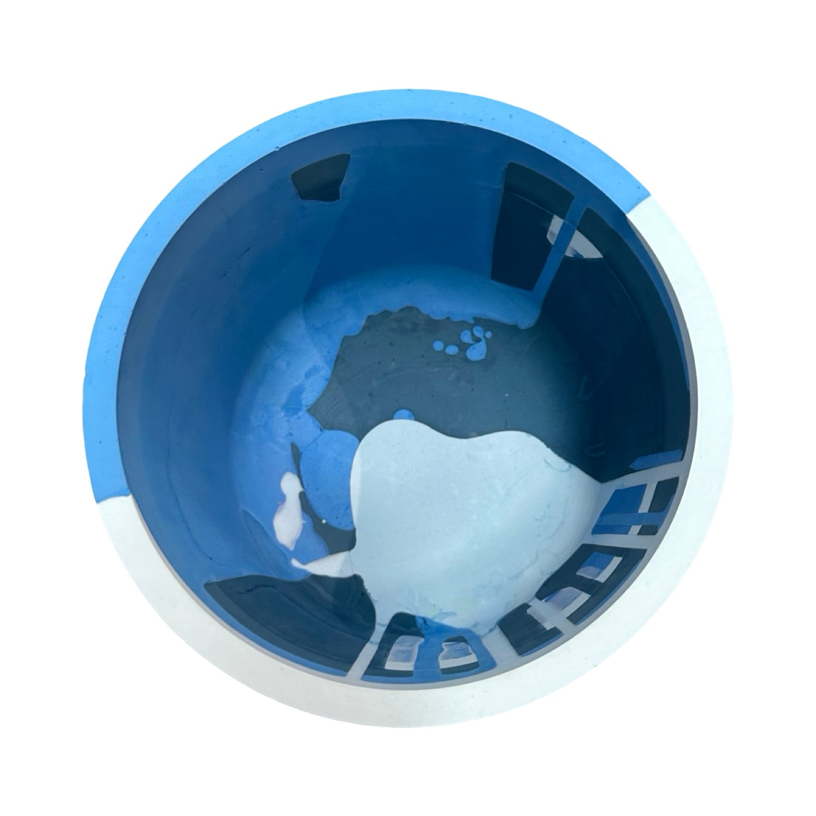 Inside of blue planter.