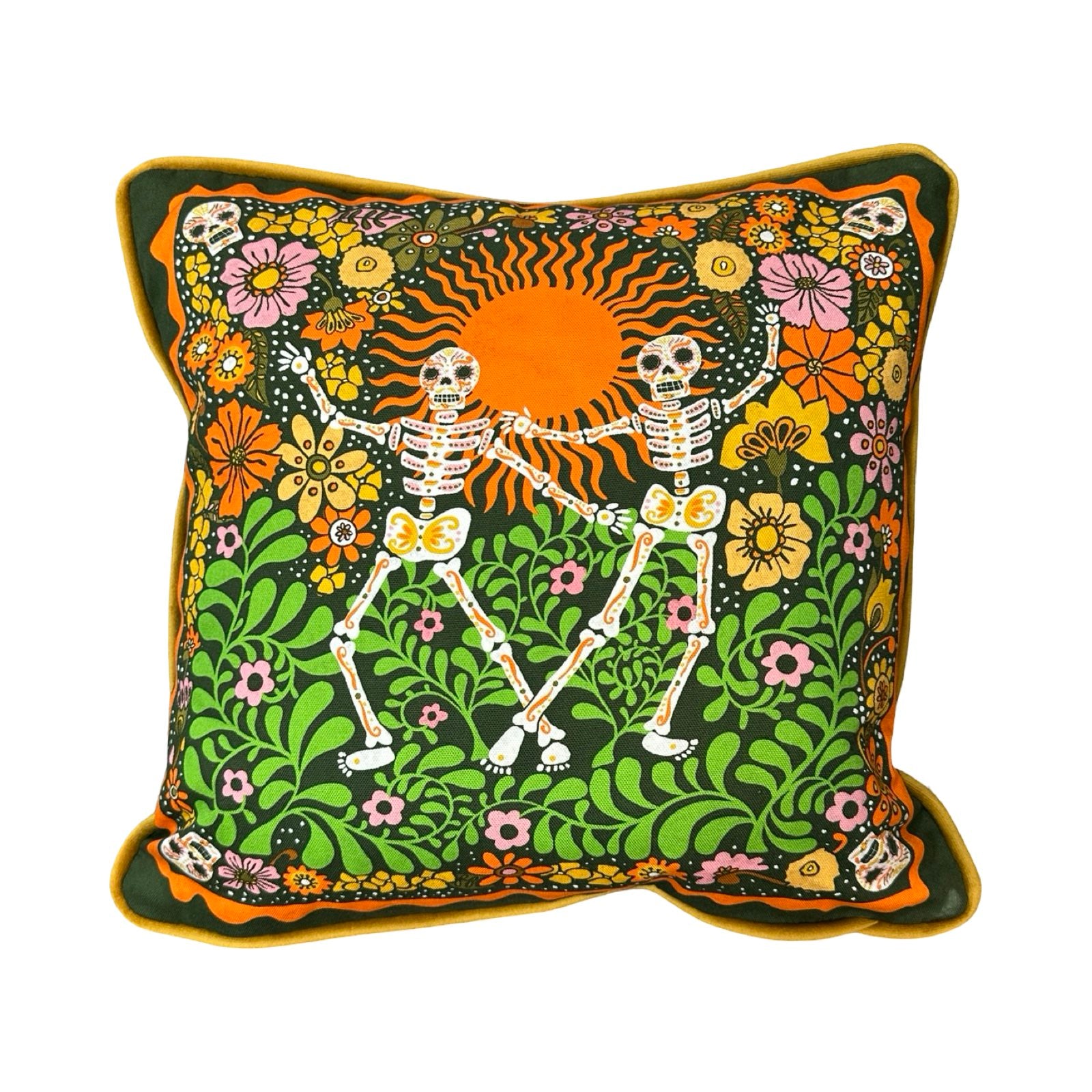 Decorative cushion with skeletons and floral design on a white background.