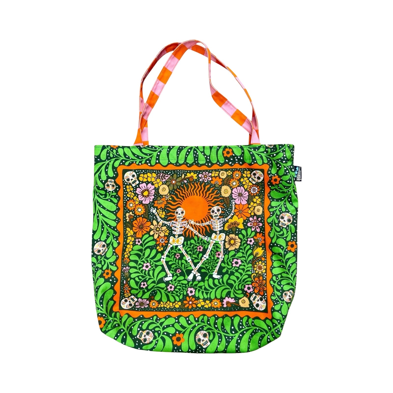 Fabulous tote bag featuring black labradors, orange dachshunds and green scottie dogs with green leaves and a lilac background with orange and white checked cotton handles.