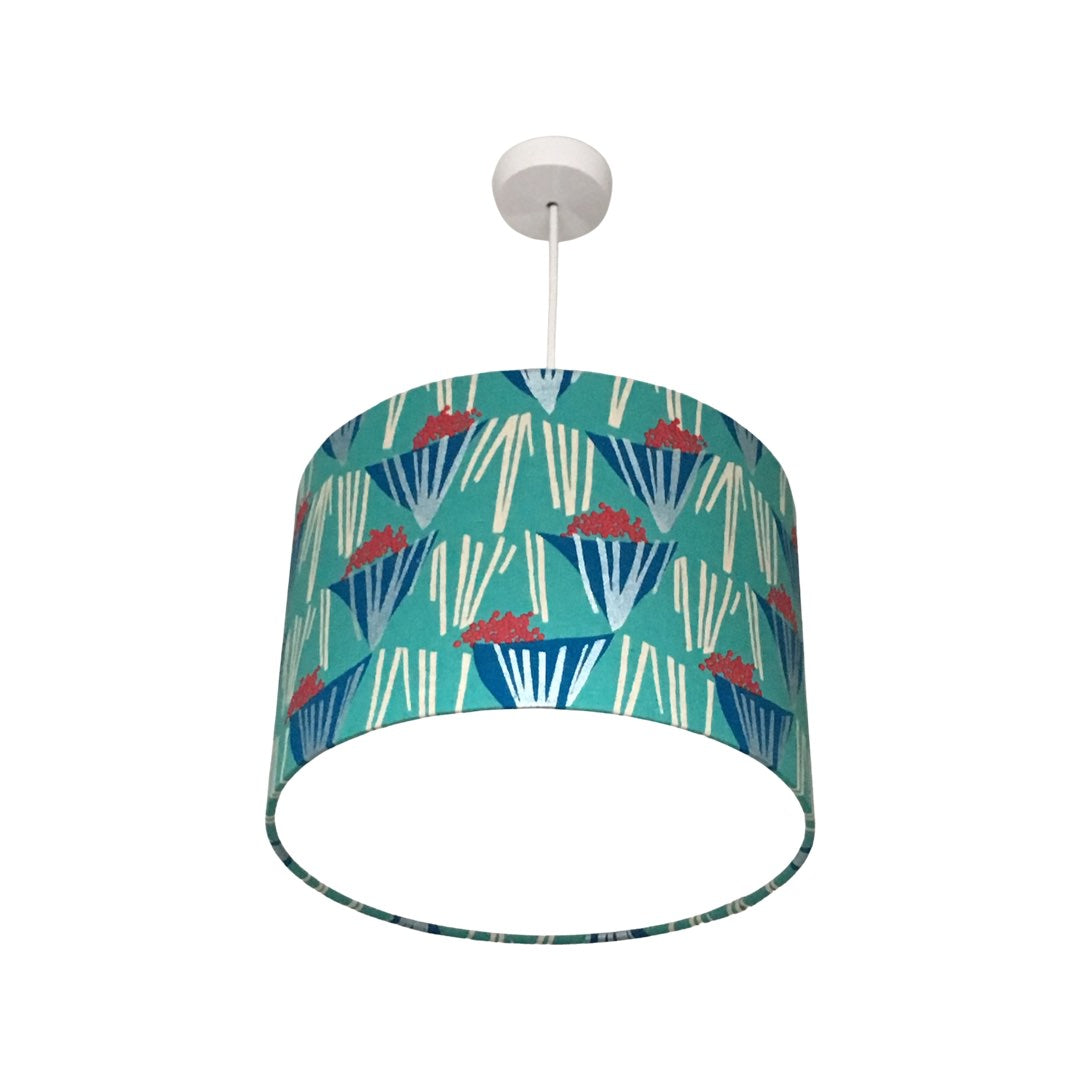 Drum lampshade in turquoise with blue and red abstract flower bouquets and silver detailing