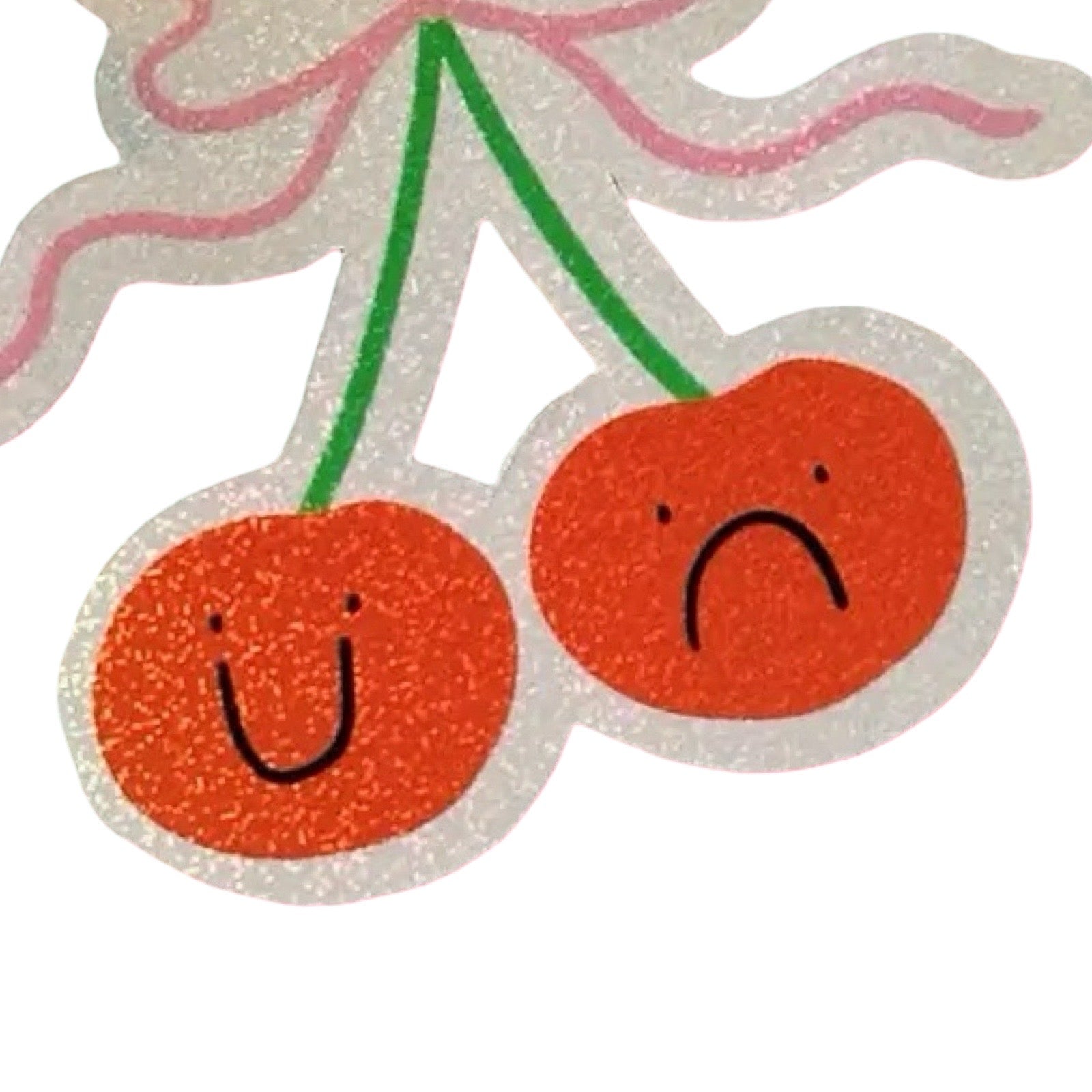 Two cherries with one smiling and one frowning on a white background.